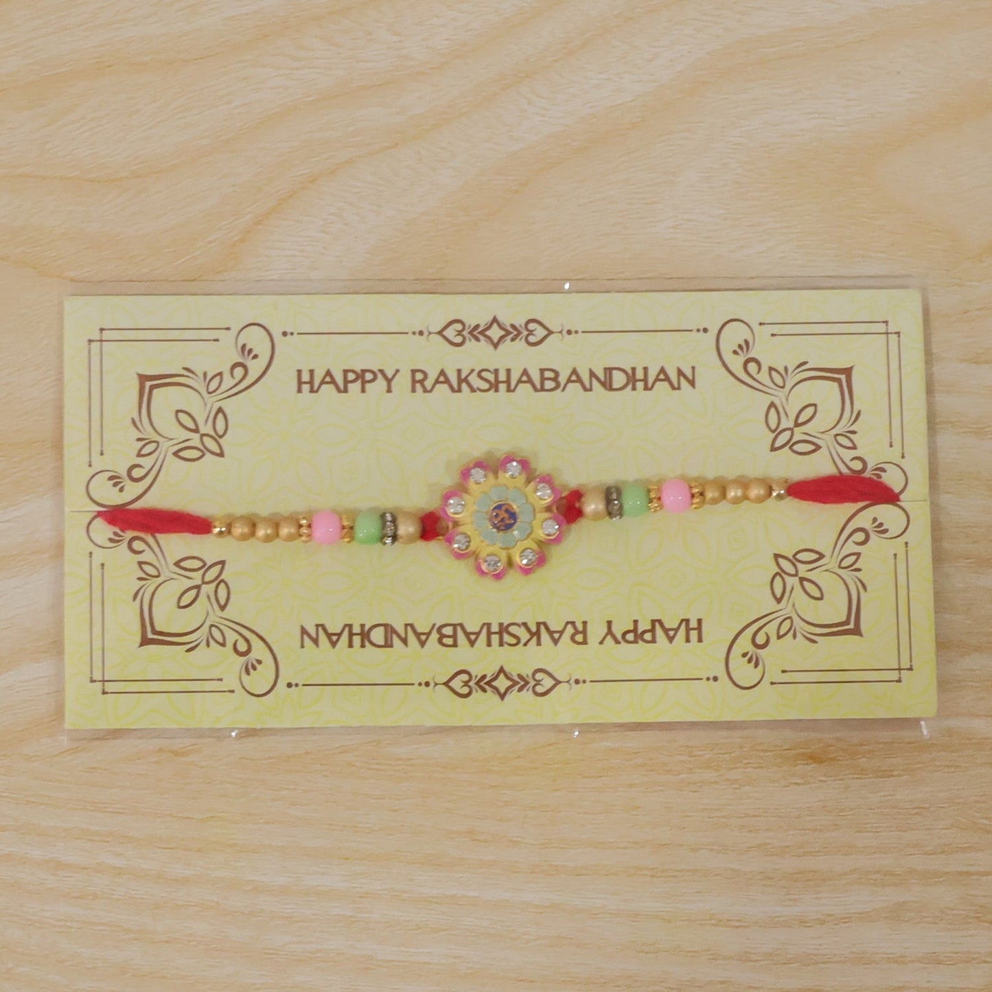 Back view of elegant Meenakari Rakhi with comfortable thread
