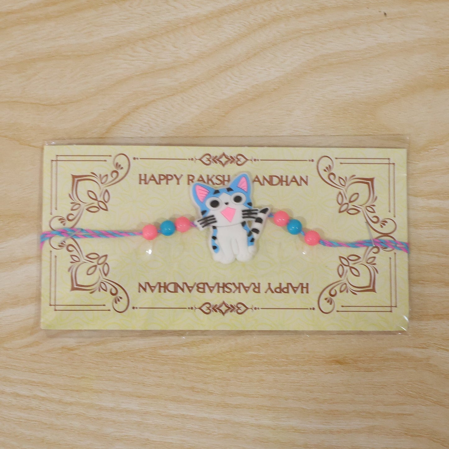 Decorative cartoon kitty cat rakhi perfect for Raksha Bandhan