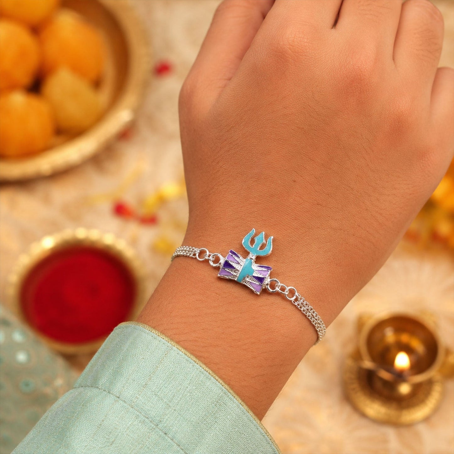 Elegant Silver Trishul Rakhi with festive backdrop