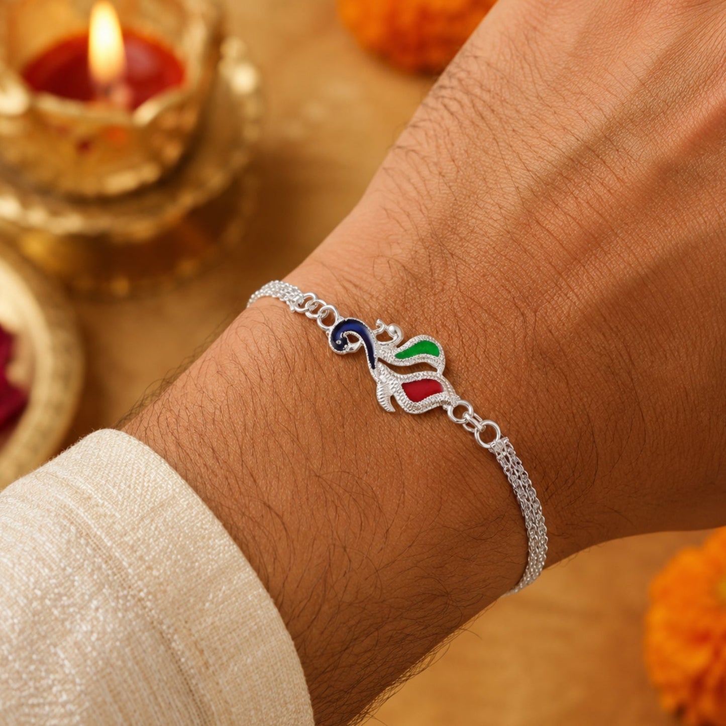 Stylish Silver Peacock Rakhi with vibrant enamel work for Raksha Bandhan