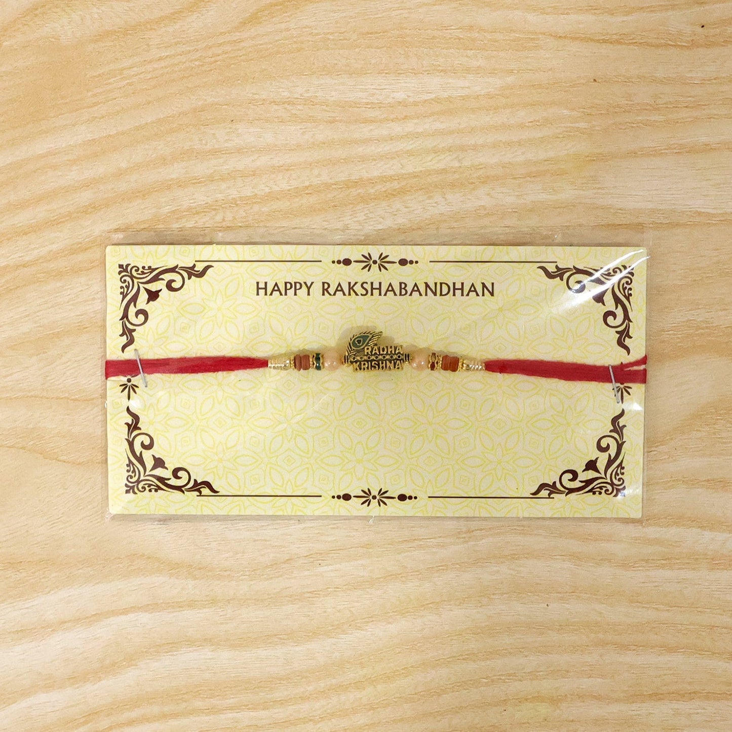 Beautiful traditional Rakhi with peacock feather design and beads for brothers