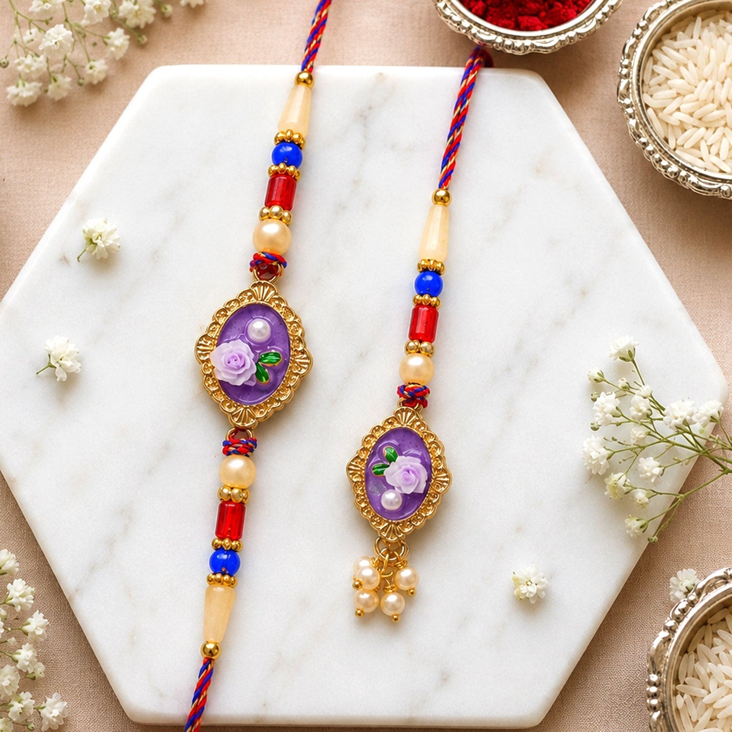 Stylish and traditional Bhaiya Bhabhi Rakhi Set with premium pearl embellishments
