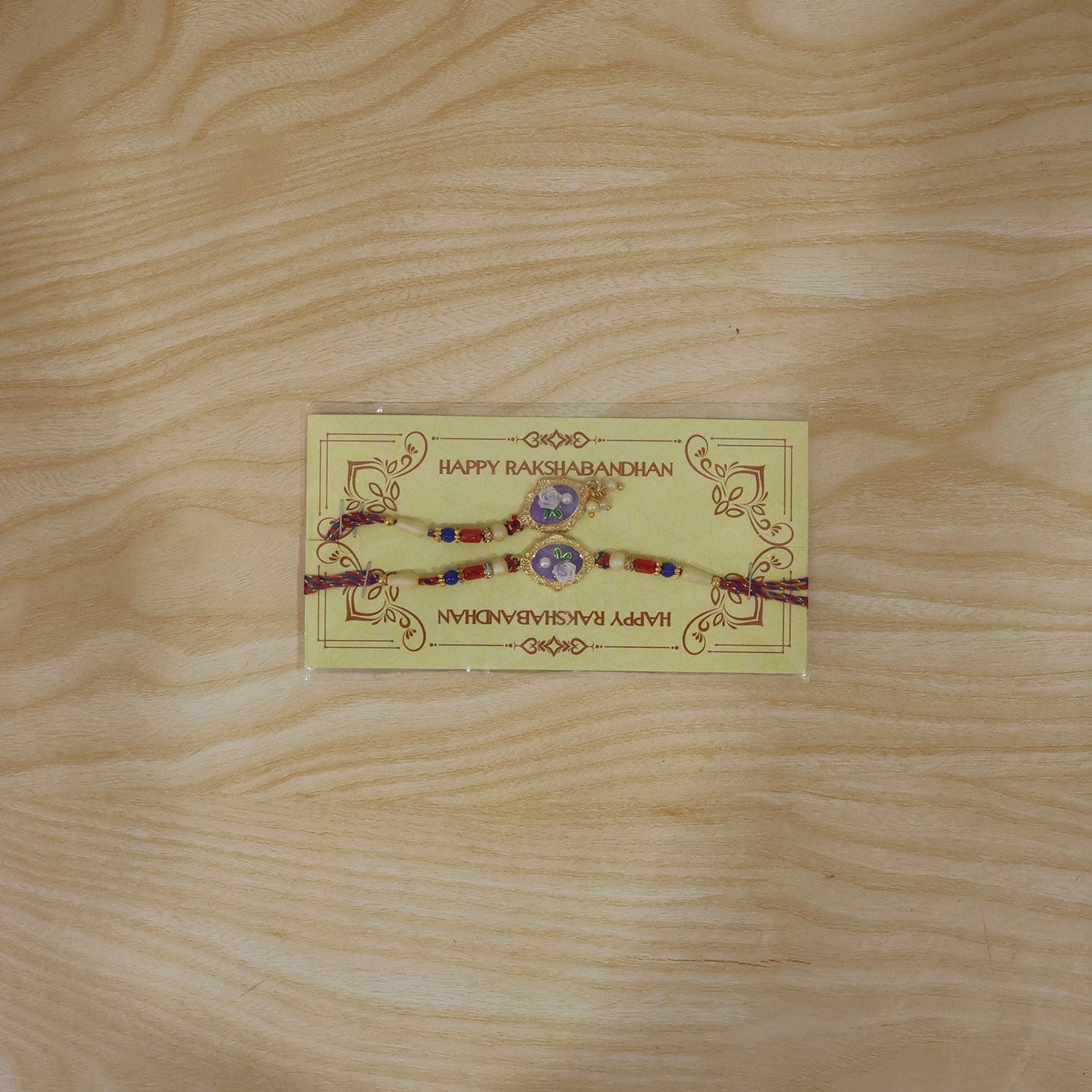 Elegant Rakhi for Bhaiya Bhabhi with pearl and enamel craftsmanship