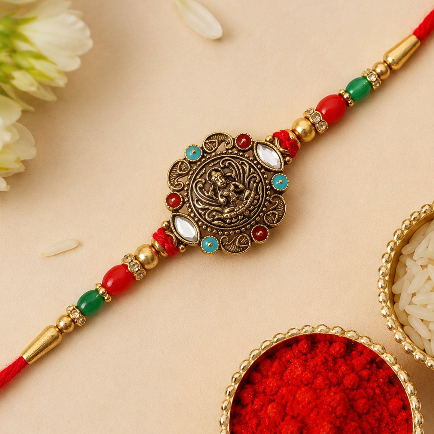 Elegant antique golden rakhi with kundan stones and colorful beads, perfect for Rakshabandhan celebrations.