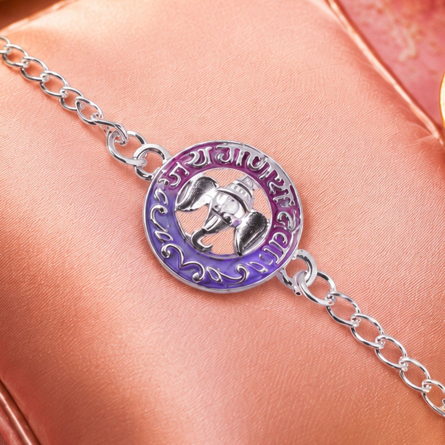 Elegant silver chain bracelet featuring Lord Ganesha, ideal for Rakhi celebrations