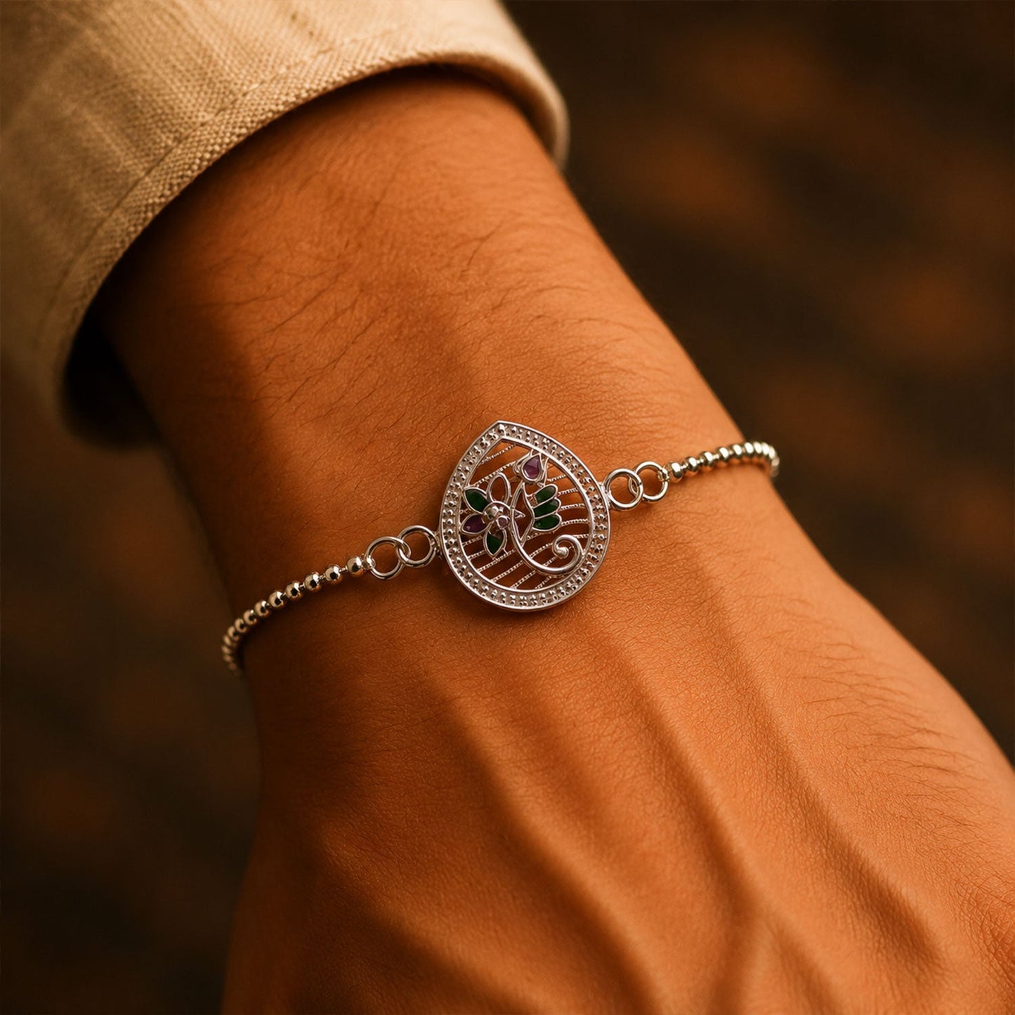 Beautiful enamel floral Rakhi perfect for brothers of all ages