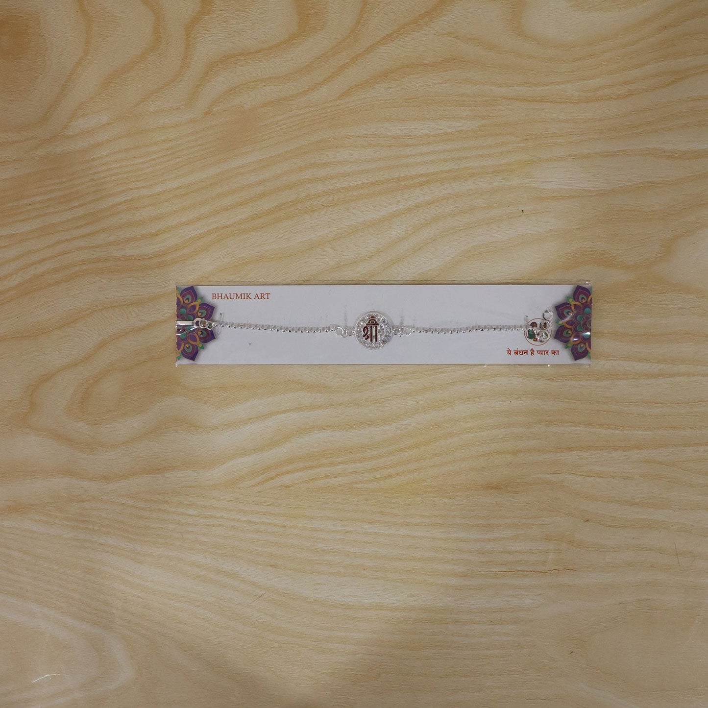 Stylish Silver Shree enamel stone Rakhi, a meaningful gift for Raksha Bandhan
