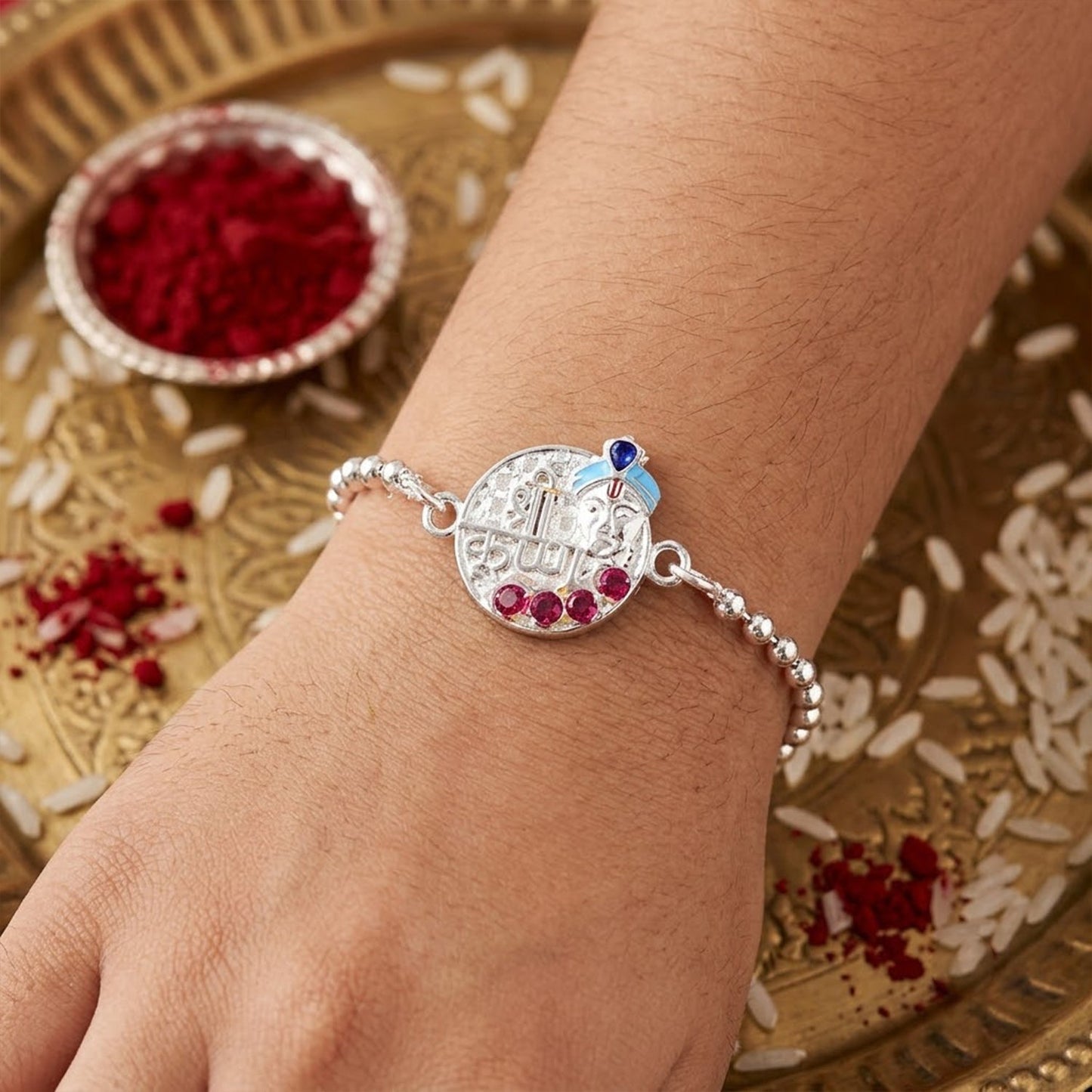 Beautiful designer Rakhi with sparkling stones, ideal for Raksha Bandhan