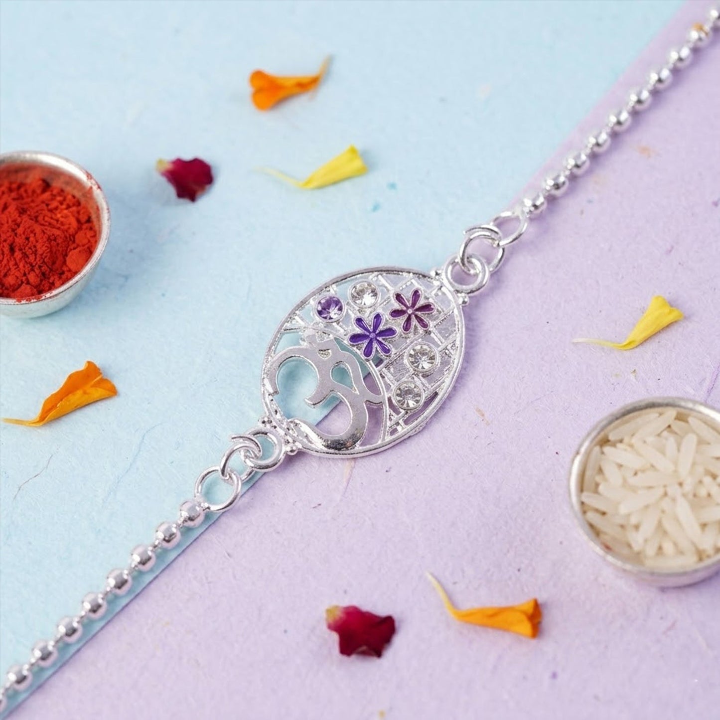 Om symbol floral Rakhi with intricate design, perfect for Raksha Bandhan celebrations