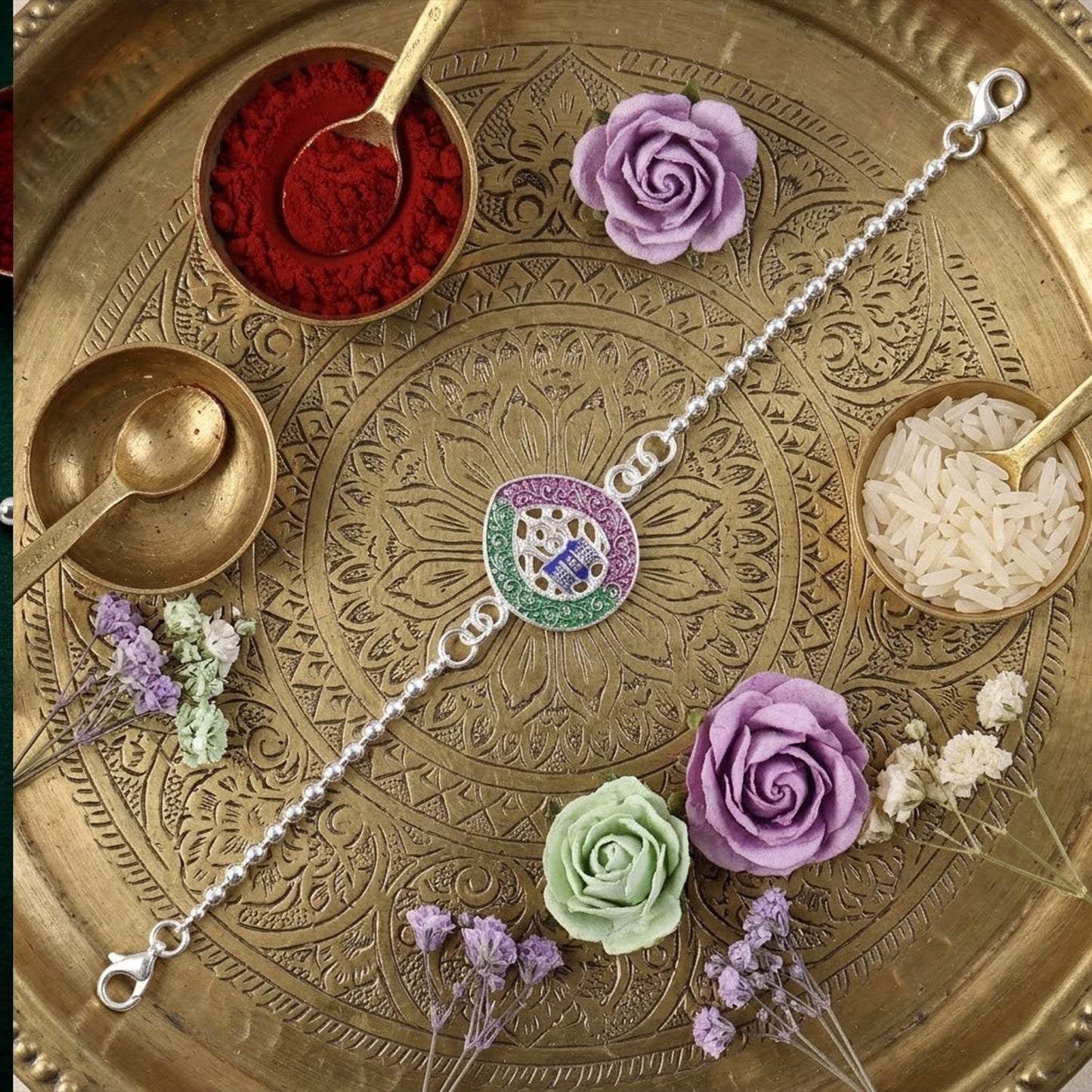 Stylish Om Damaru rakhi with traditional and modern appeal