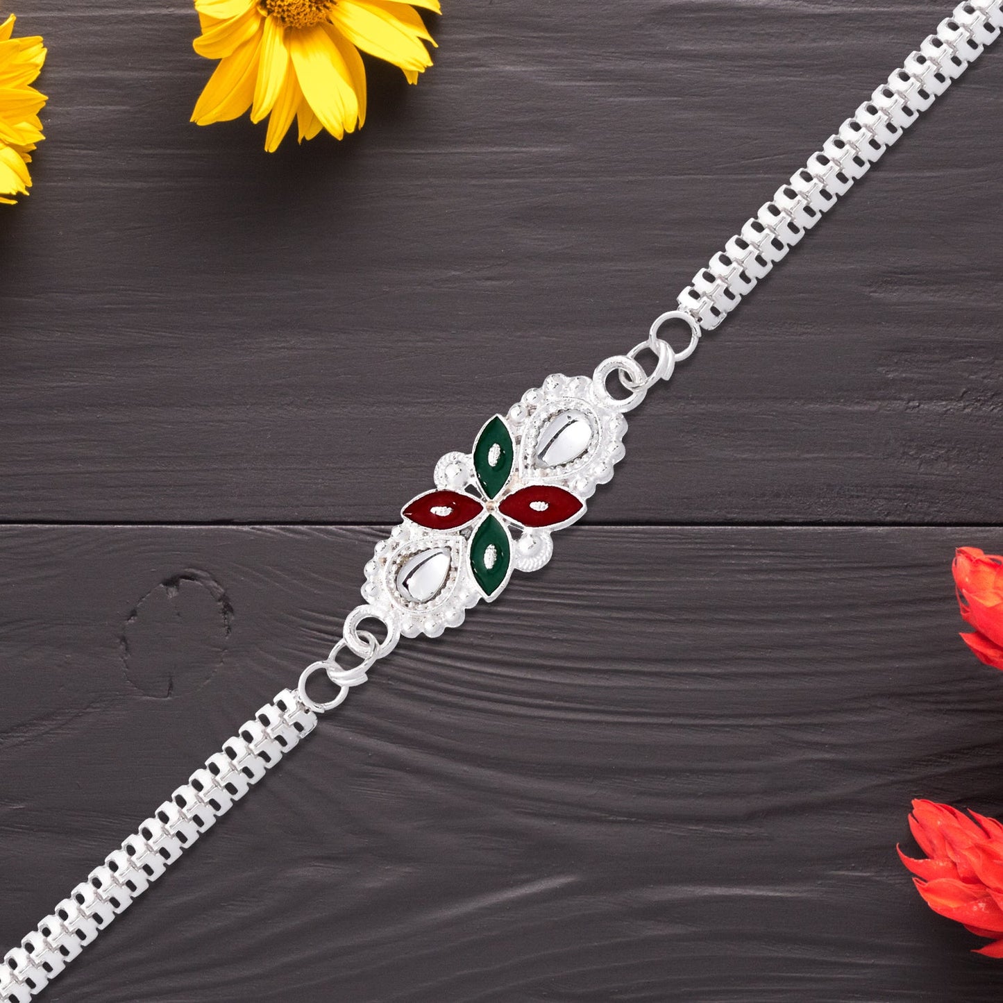Top-down view of the elegant Floral Rakhi featuring a durable metal chain.