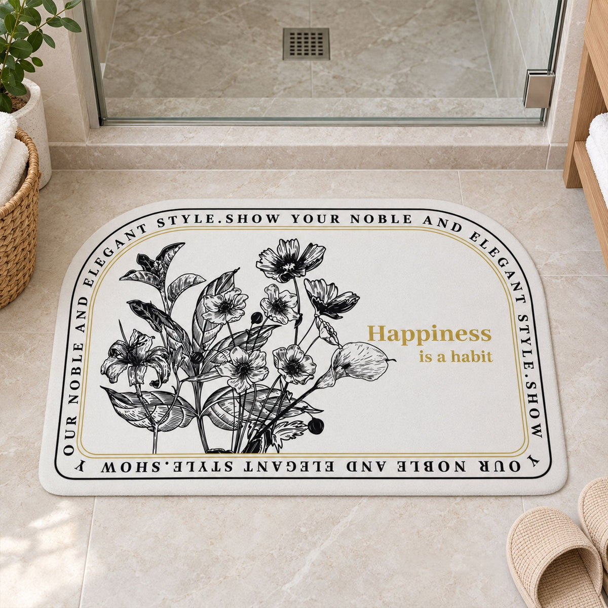 A half-round white mat with a black floral design and a golden quote, next to slippers in a contemporary bathroom.