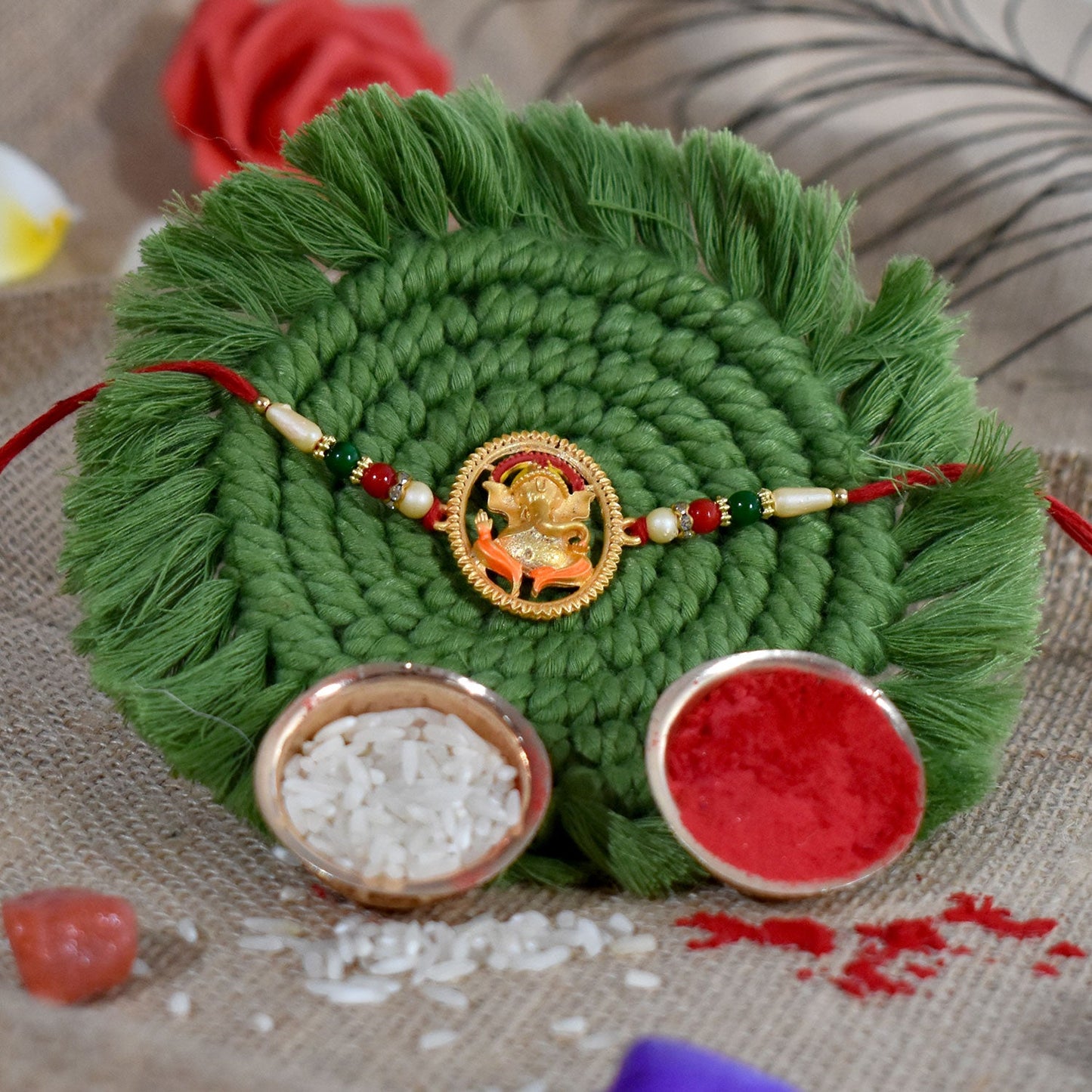 Side view showcasing unique design details of the devotional Ganesha Rakhi.