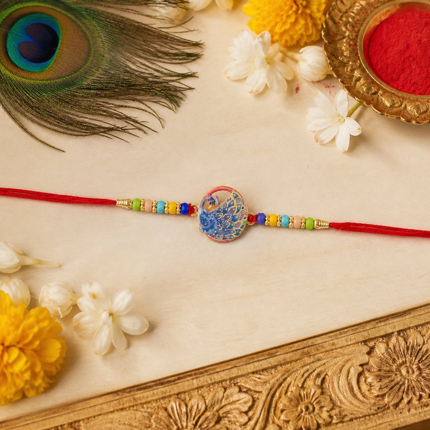 Top view of Peacock Rakhi highlighting intricate centerpiece