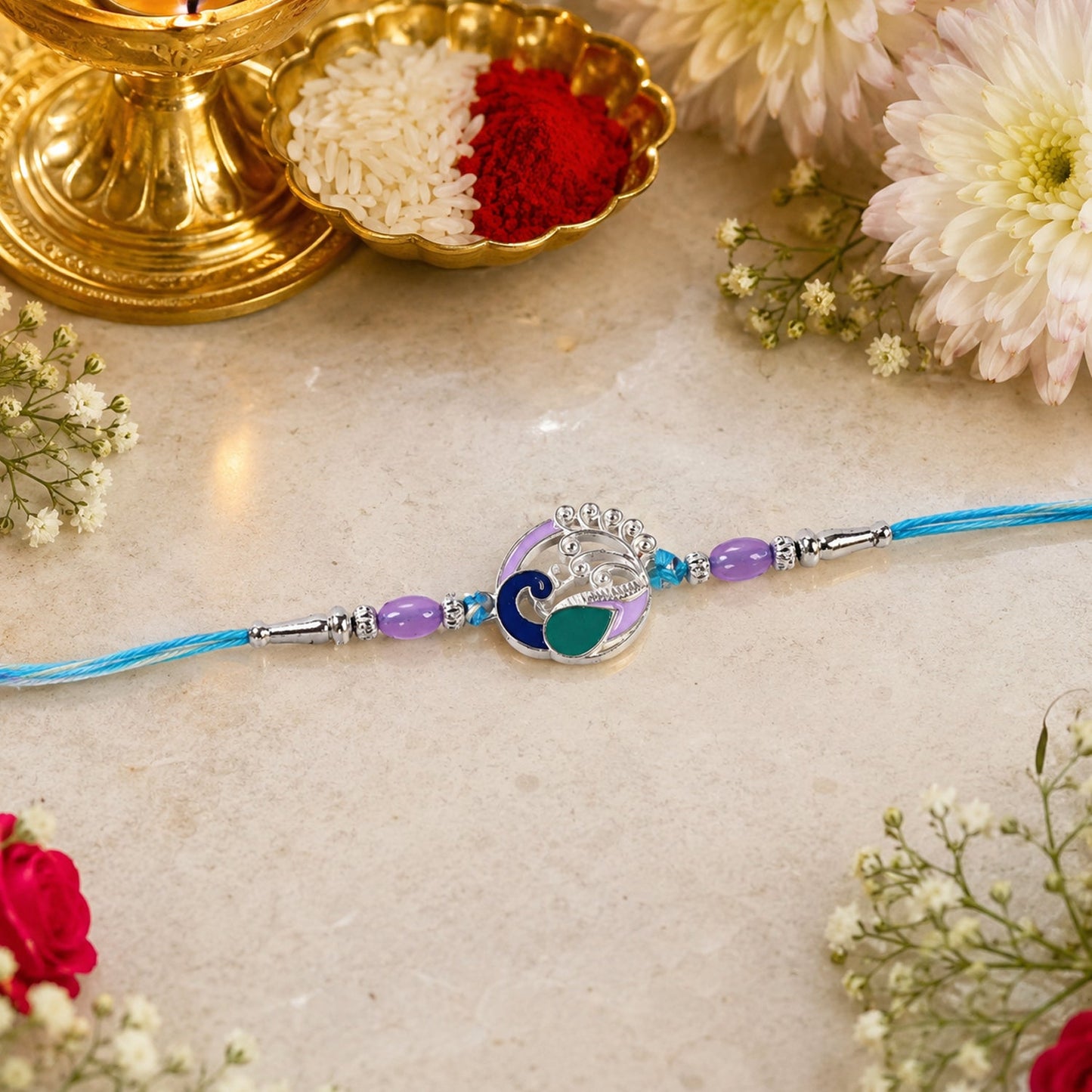 Detailed view of Peacock motif Rakhi with beads and thread