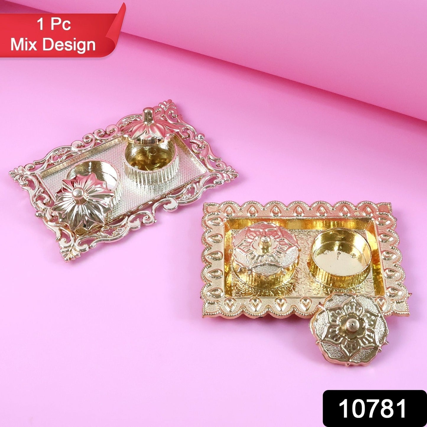 Two ornate rectangular pooja thalis, one gold and one silver, with small containers, on a pink background with a red label.