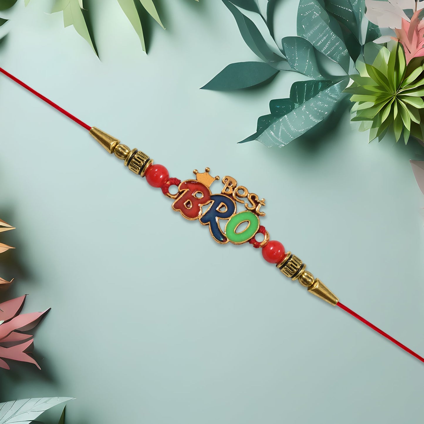 Brother wearing Best Bro Rakhi featuring colorful beads and regal crown design
