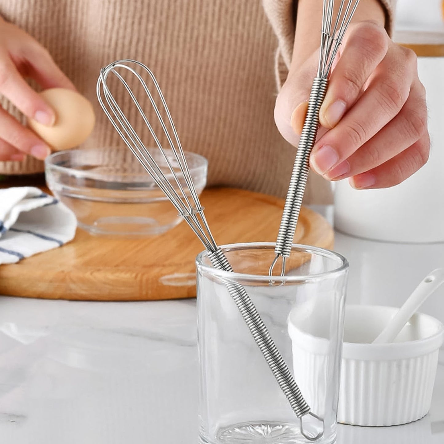 Compact 16cm kitchen whisk made from durable stainless steel