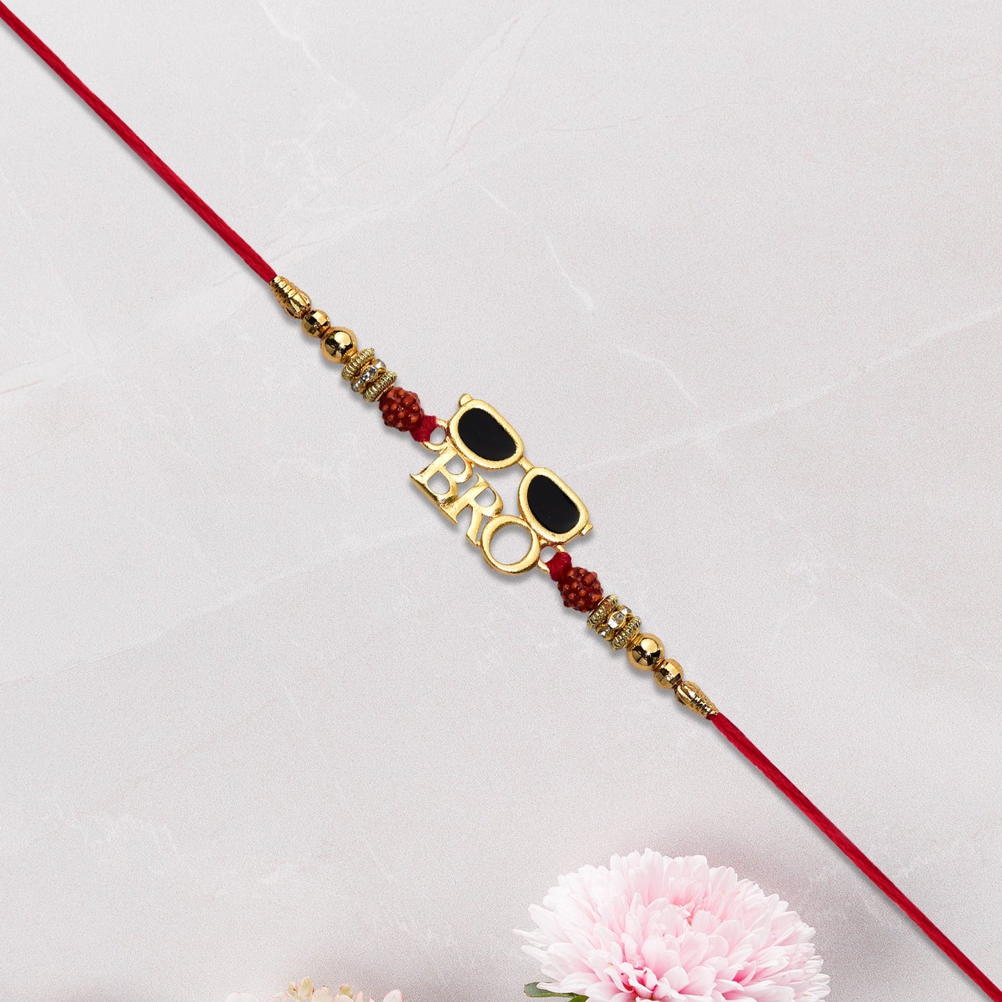 Detailed view of the premium thread craftsmanship on the designer Bro Rakhi.