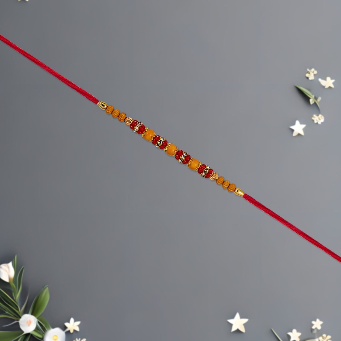 Elegant multicolor beaded rakhi displayed against a white background for Raksha Bandhan.