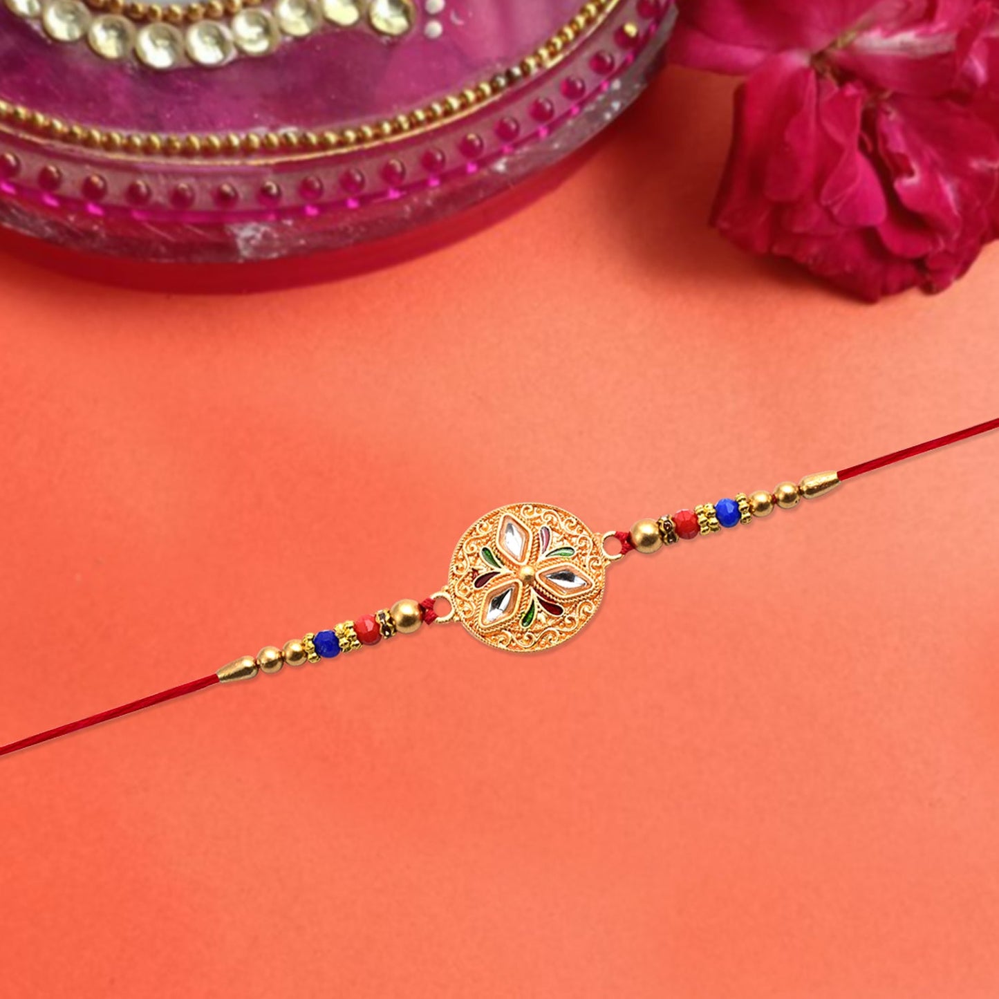 Handcrafted Meenakari floral Rakhi adorned with vibrant colorful beads