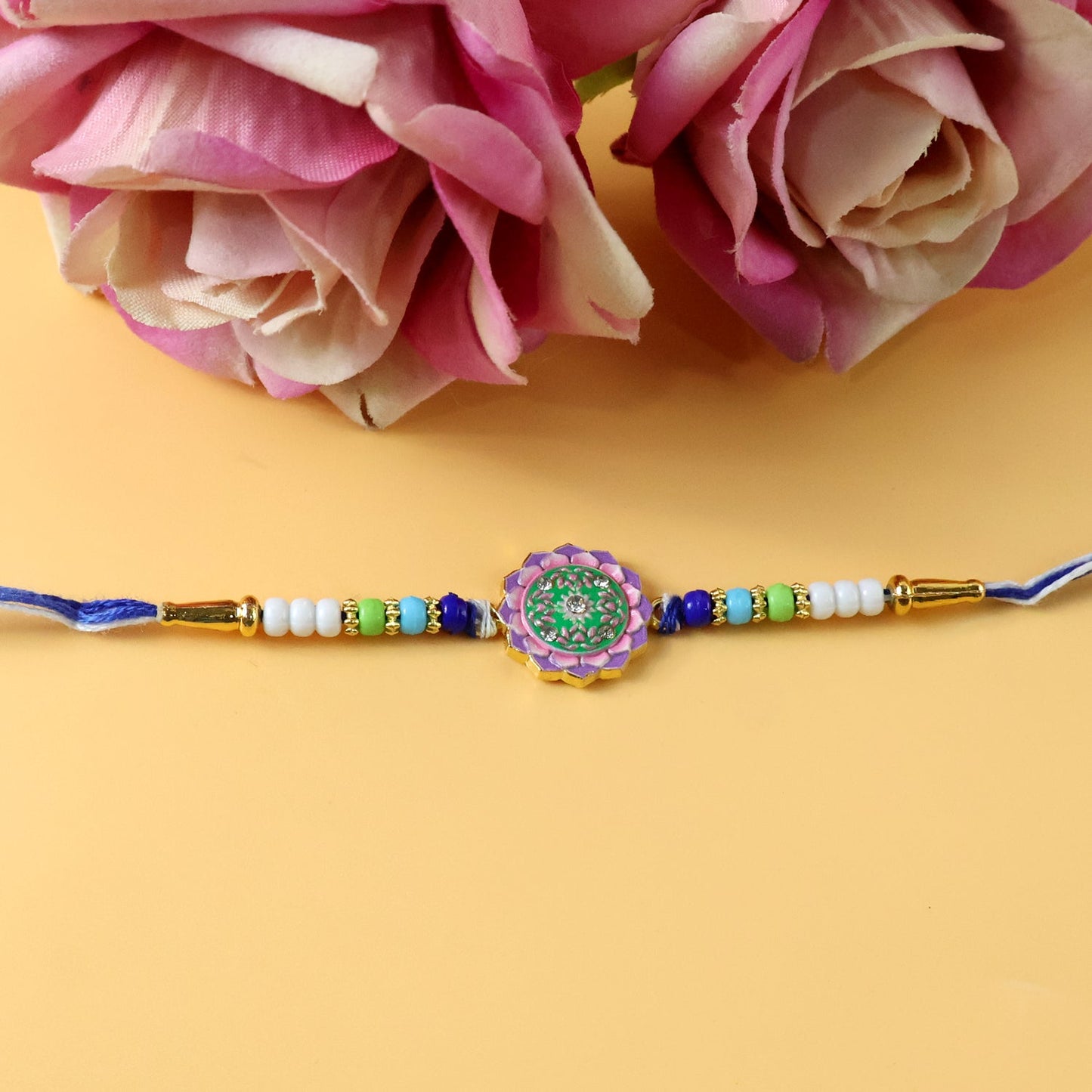 Beautiful floral Rakhi for Raksha Bandhan with detailed beadwork