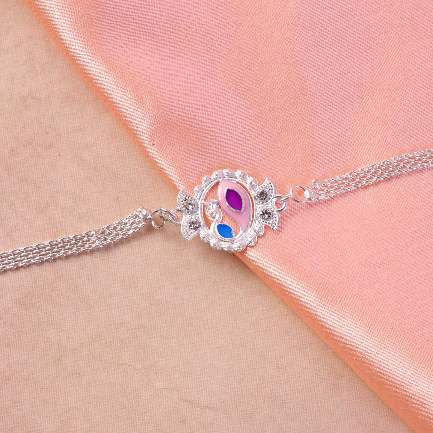 Festive peacock Rakhi with soft thread and elegant beadwork