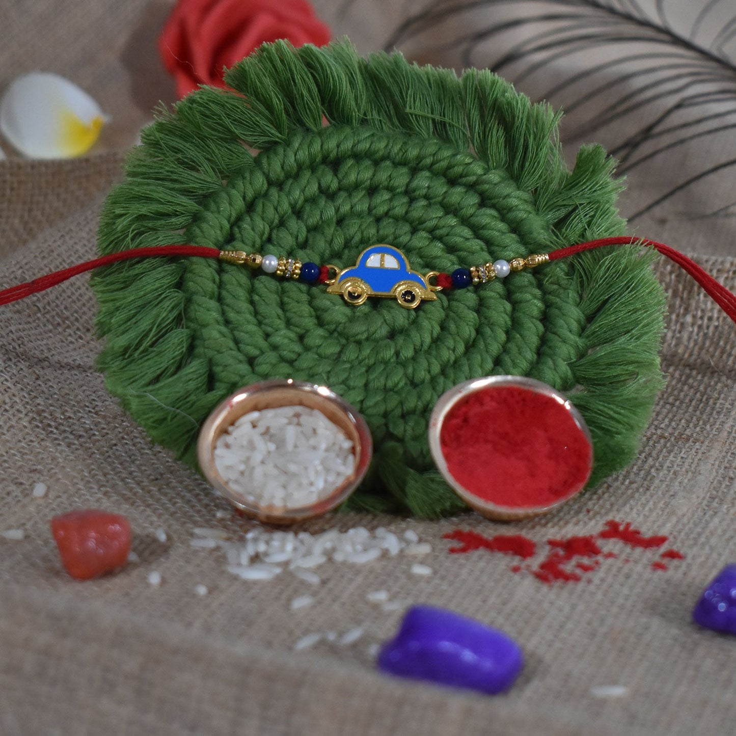 Blue Car Rakhi packaged beautifully, ideal for gifting to little brothers during Raksha Bandhan.