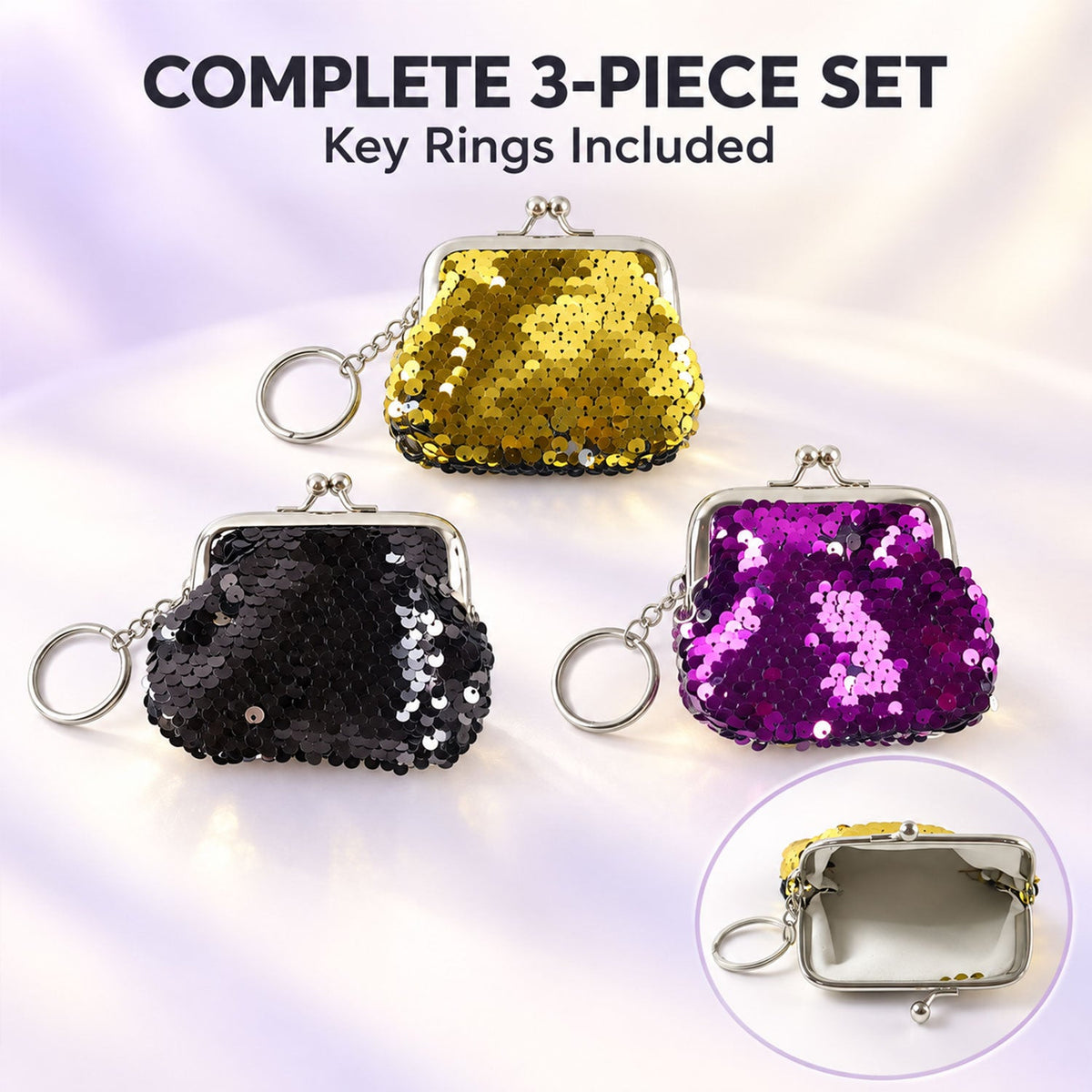 A three-piece set of sequined coin purses in gold, black, and purple, each with a silver key ring.