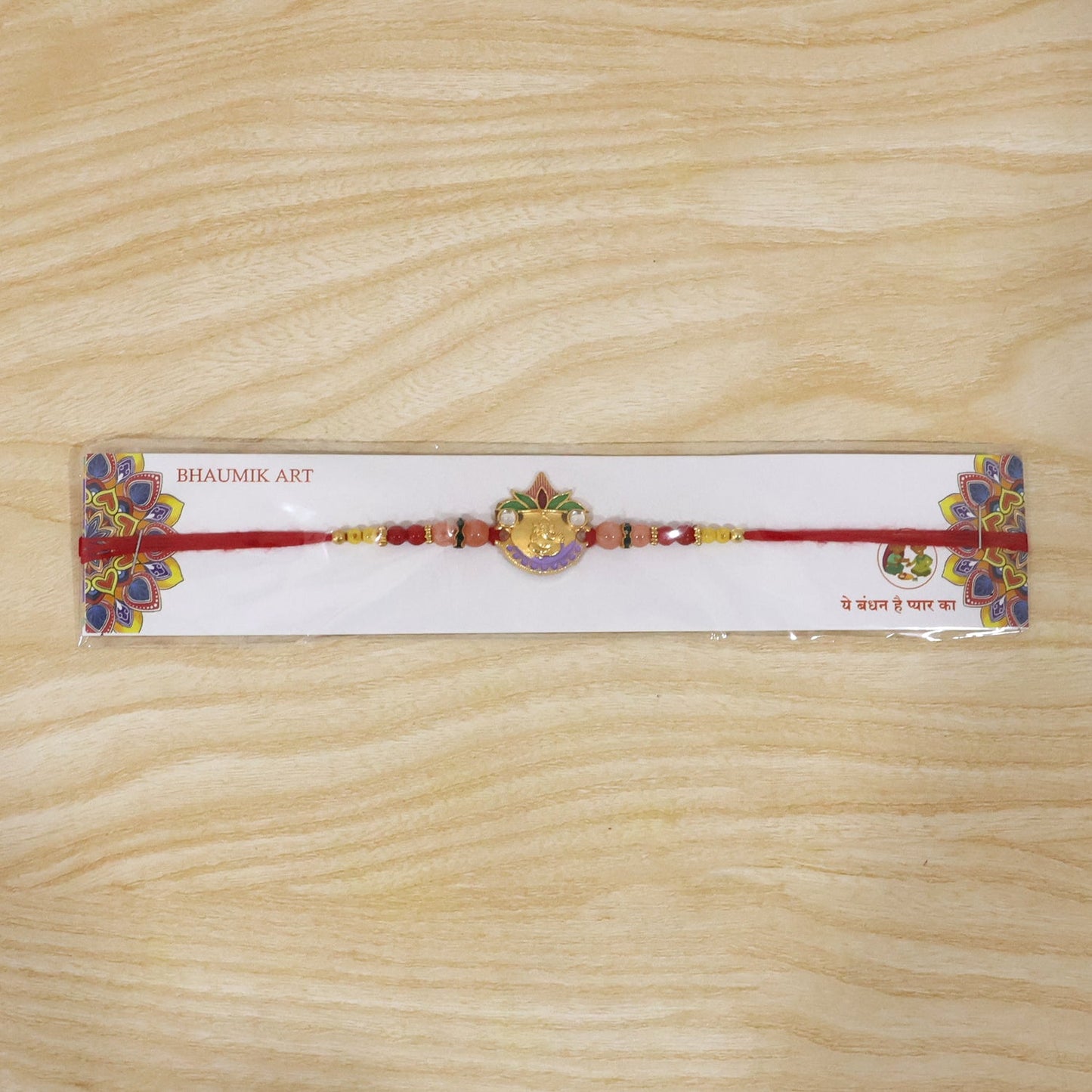 Colorful beads and intricate design on Rakhi