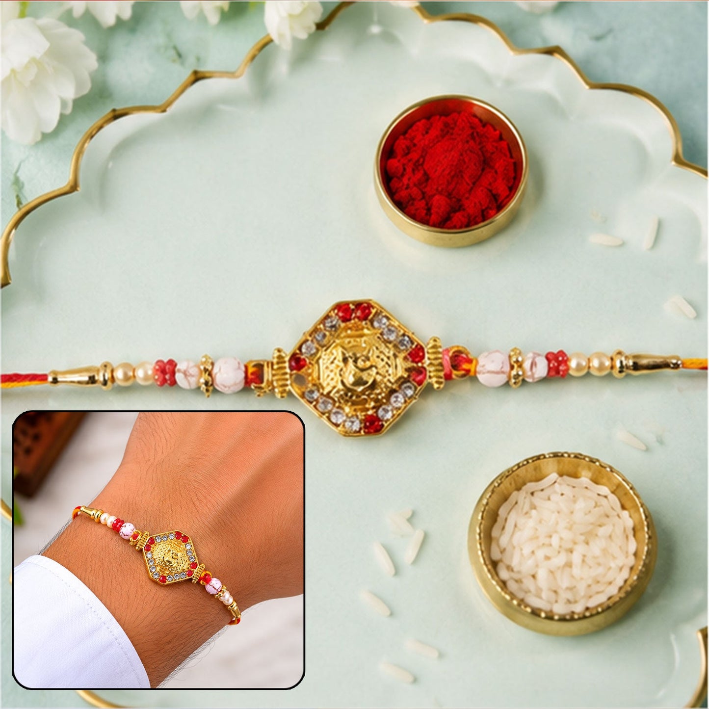 Ganesh Rakhi with golden beads and red-yellow thread front view