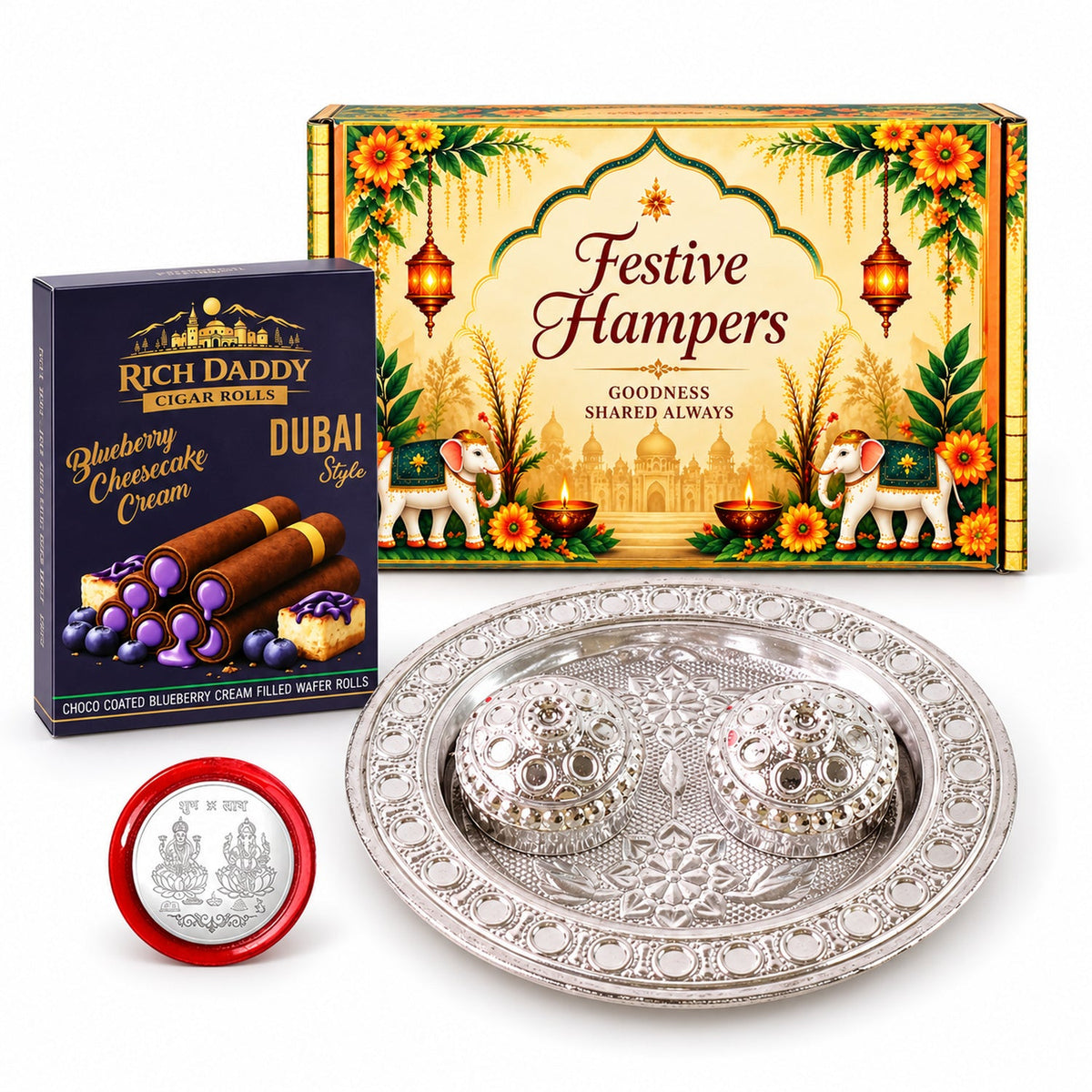 A festive gift box with a silver plate, two small ornate containers, and a box of blueberry cheesecake cream wafer rolls.