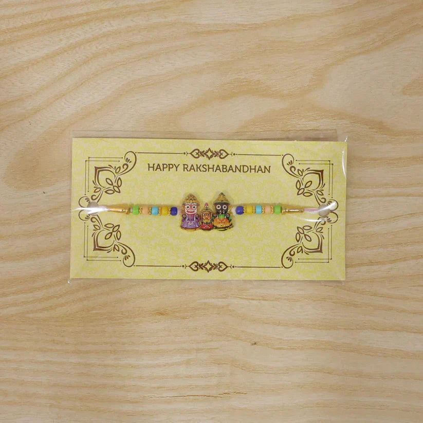 Divine Rakhi with Lord Jagannath trio, perfect for Raksha Bandhan celebrations