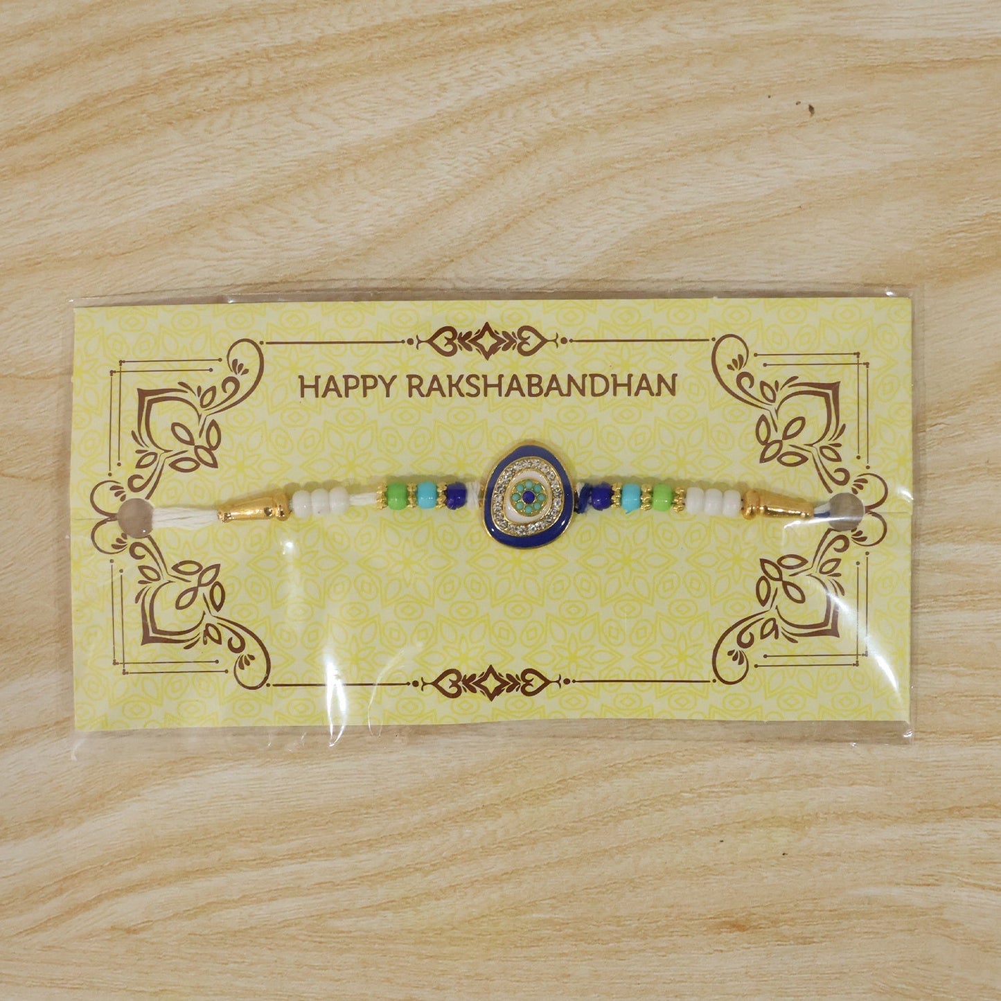 Evil Eye Kundan Diamond Rakhi tied in decorative knot