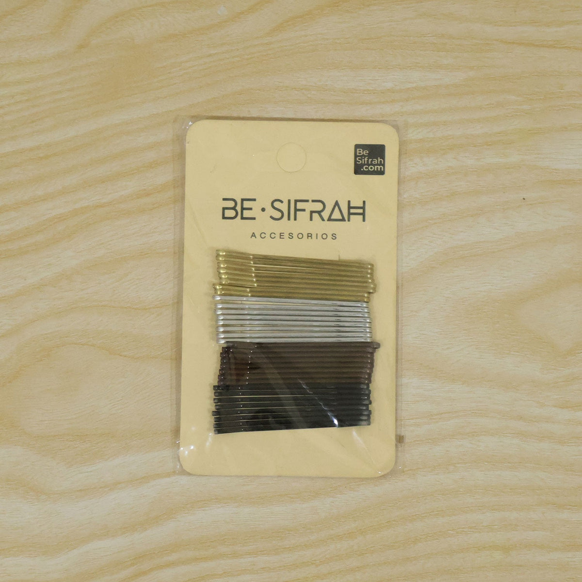 Metal hair bobby pins in a small, portable pack