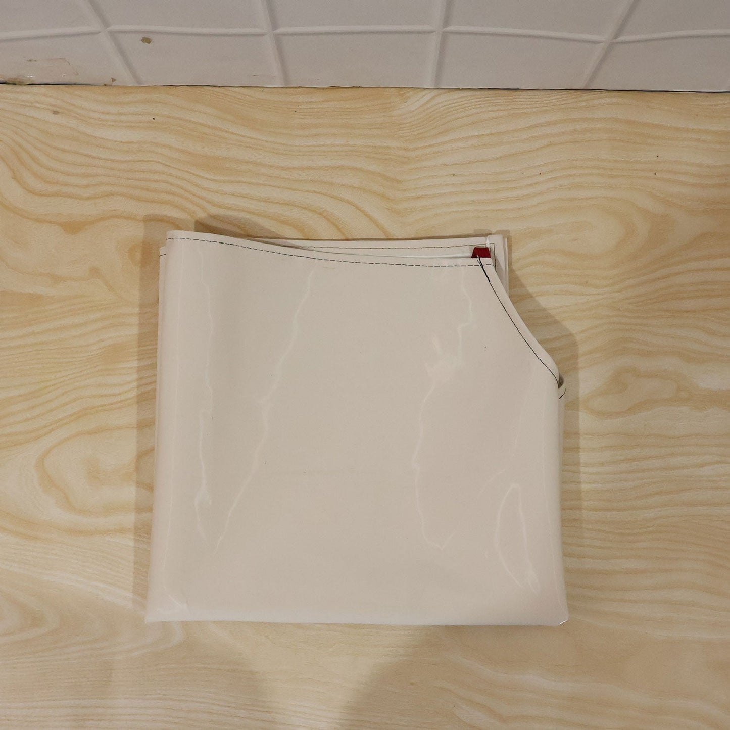 Person wearing waterproof apron while cooking