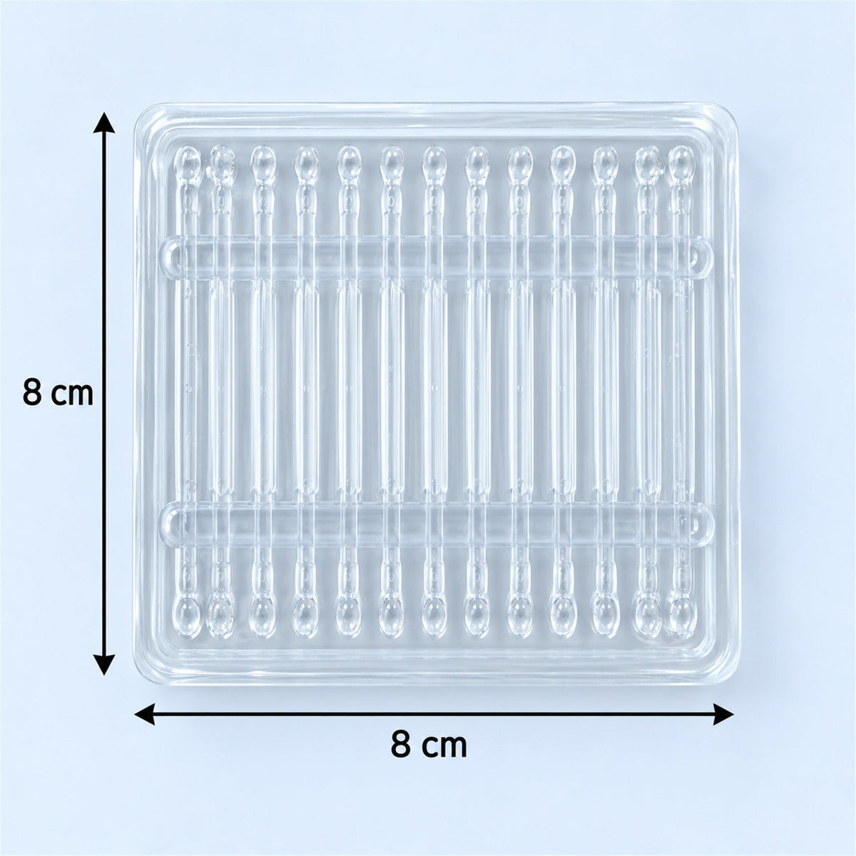 A clear plastic tray with 24 individual compartments for ear cleaning sticks, showing 8 cm dimensions.