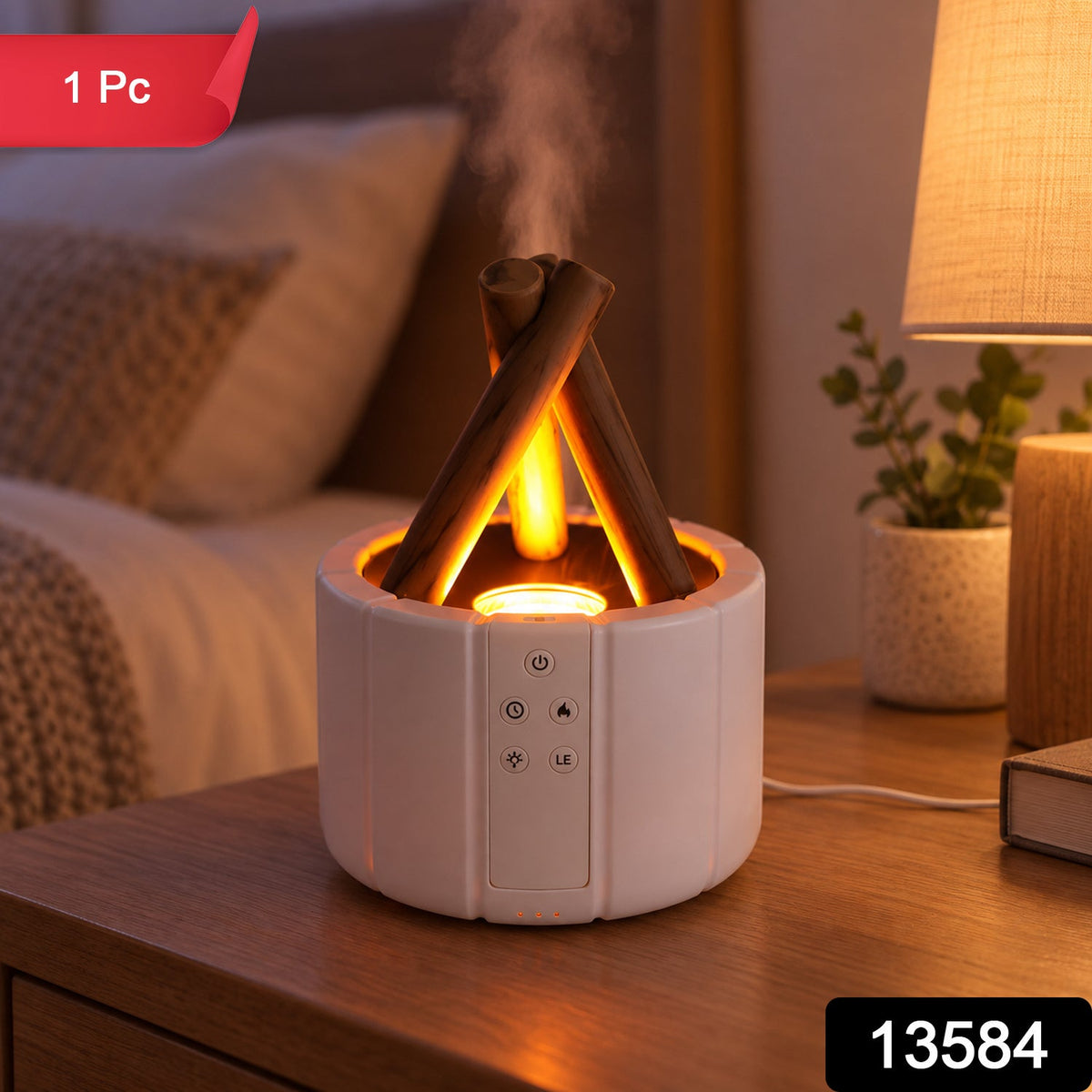 White humidifier with faux wood logs and orange light emitting mist on a bedside table, with a plant and lamp.