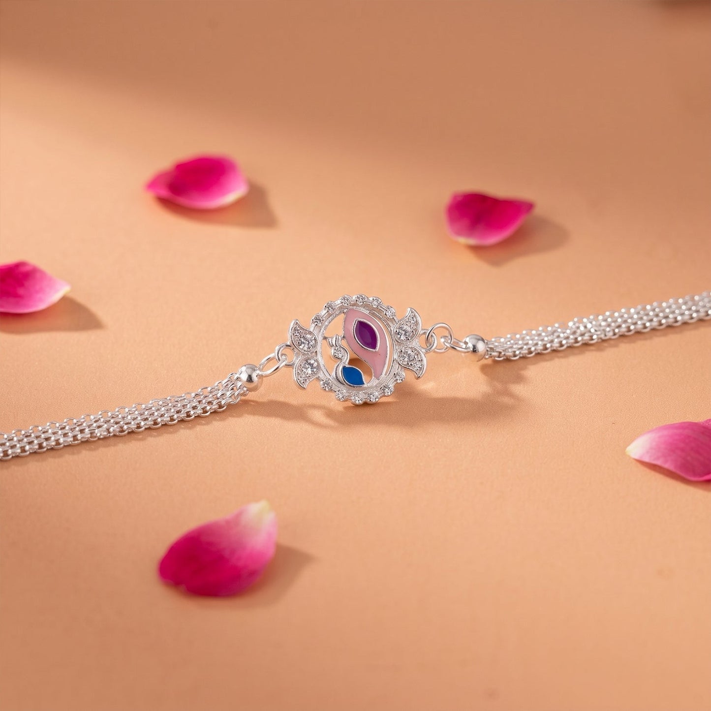 Peacock design Rakhi with decorative beads suitable for Raksha Bandhan