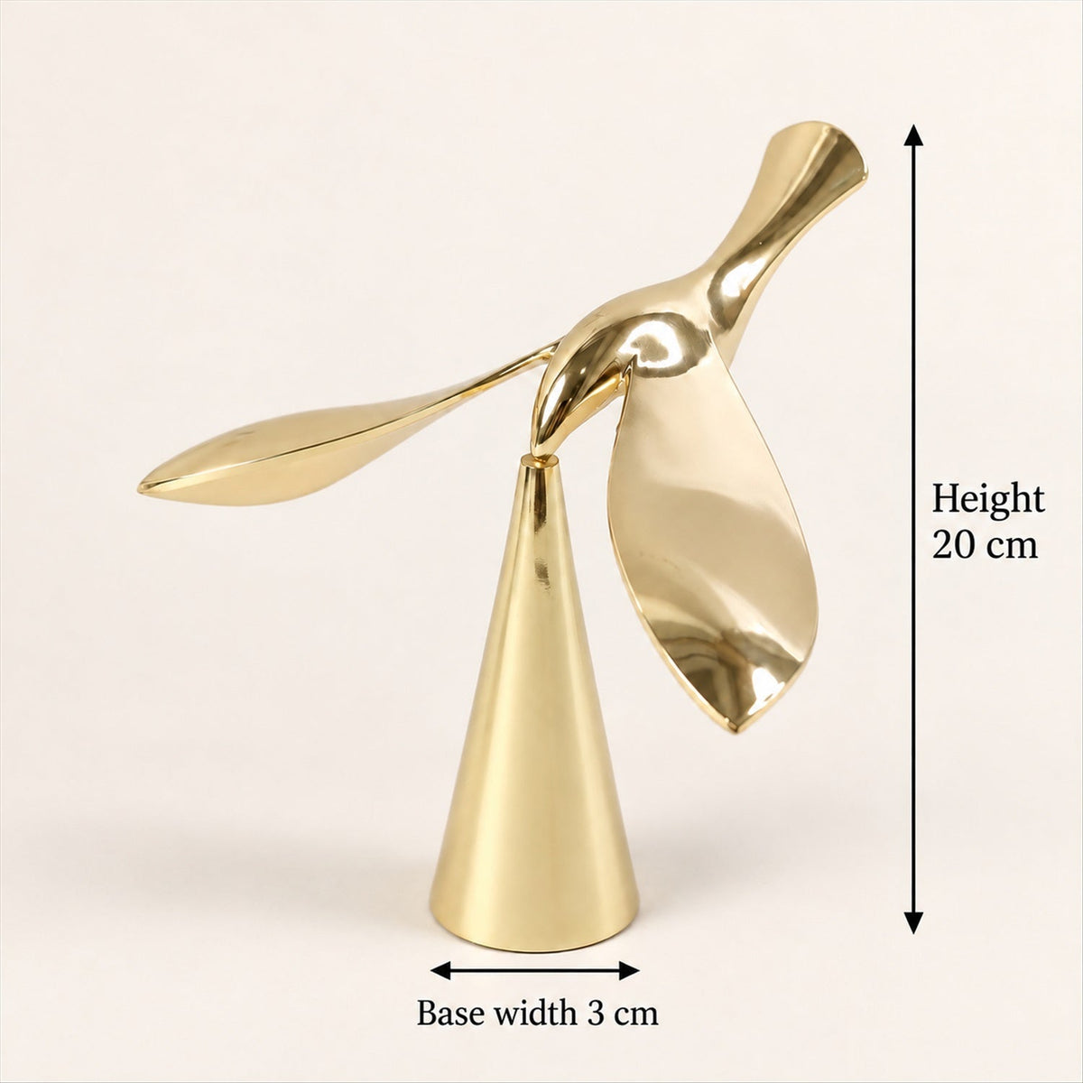 A gold balancing bird sculpture with a conical base is shown with height and base width measurements.