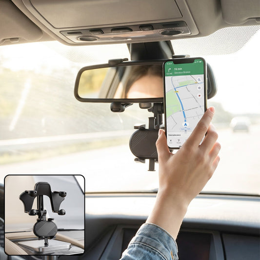 Car rear view mirror phone holder in use