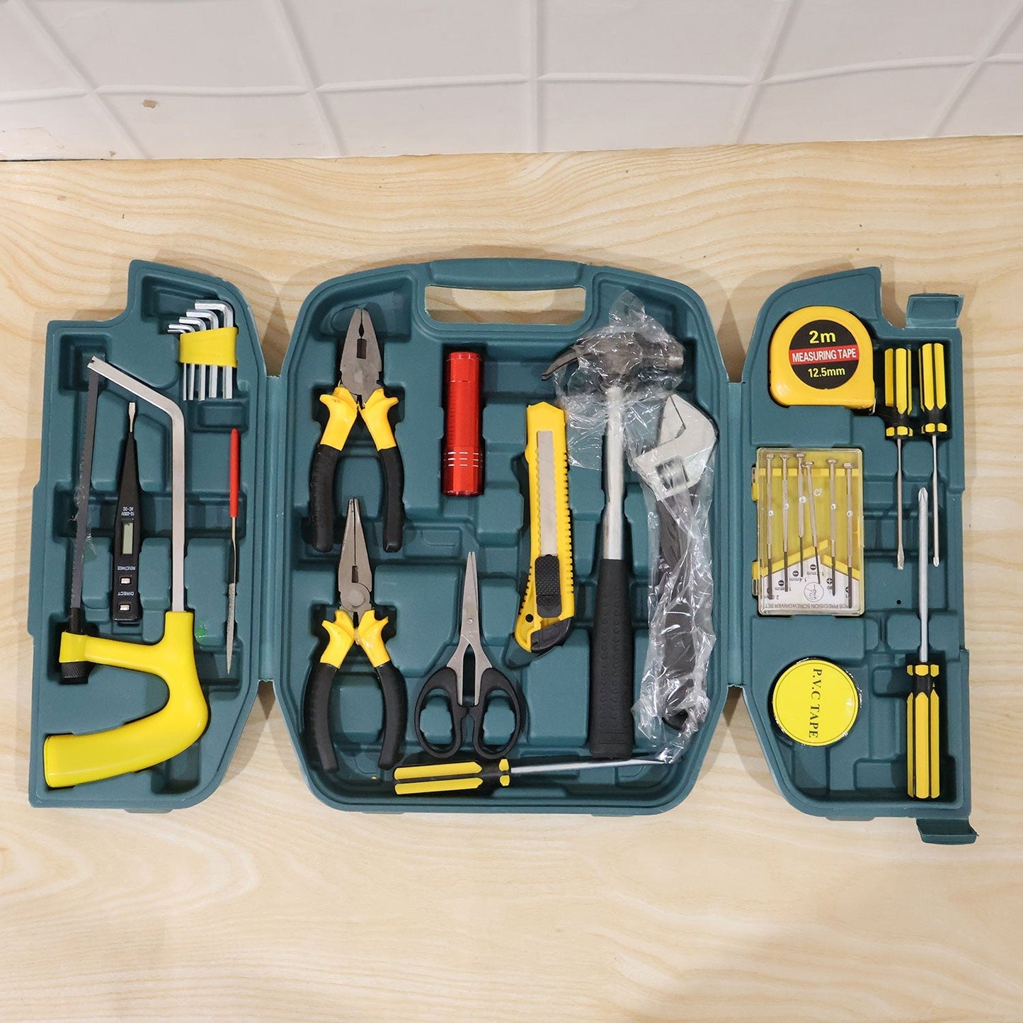 The durable yellow carry case of the Home Tool Kit Set, ready for storage.