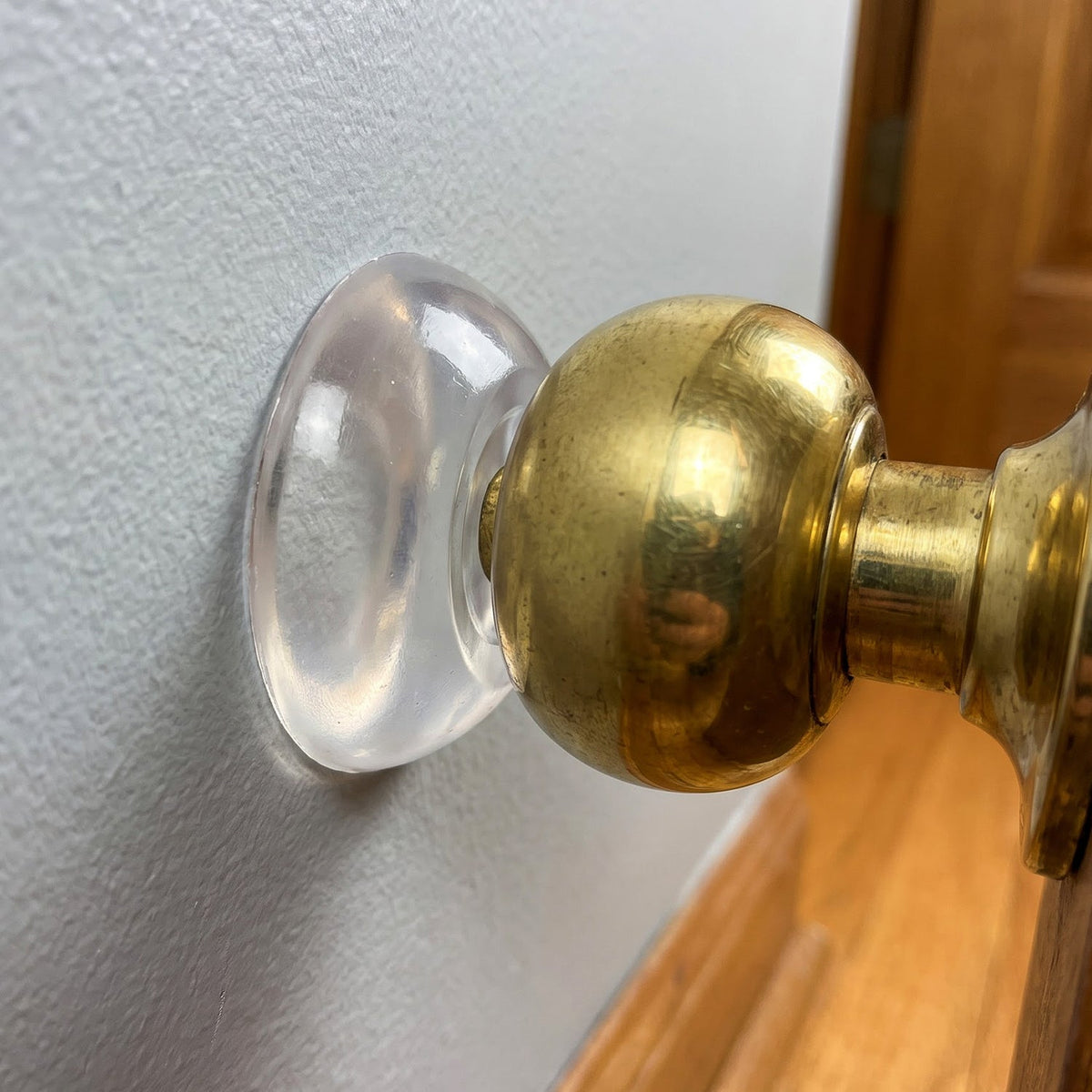 Door knob wall protector in use