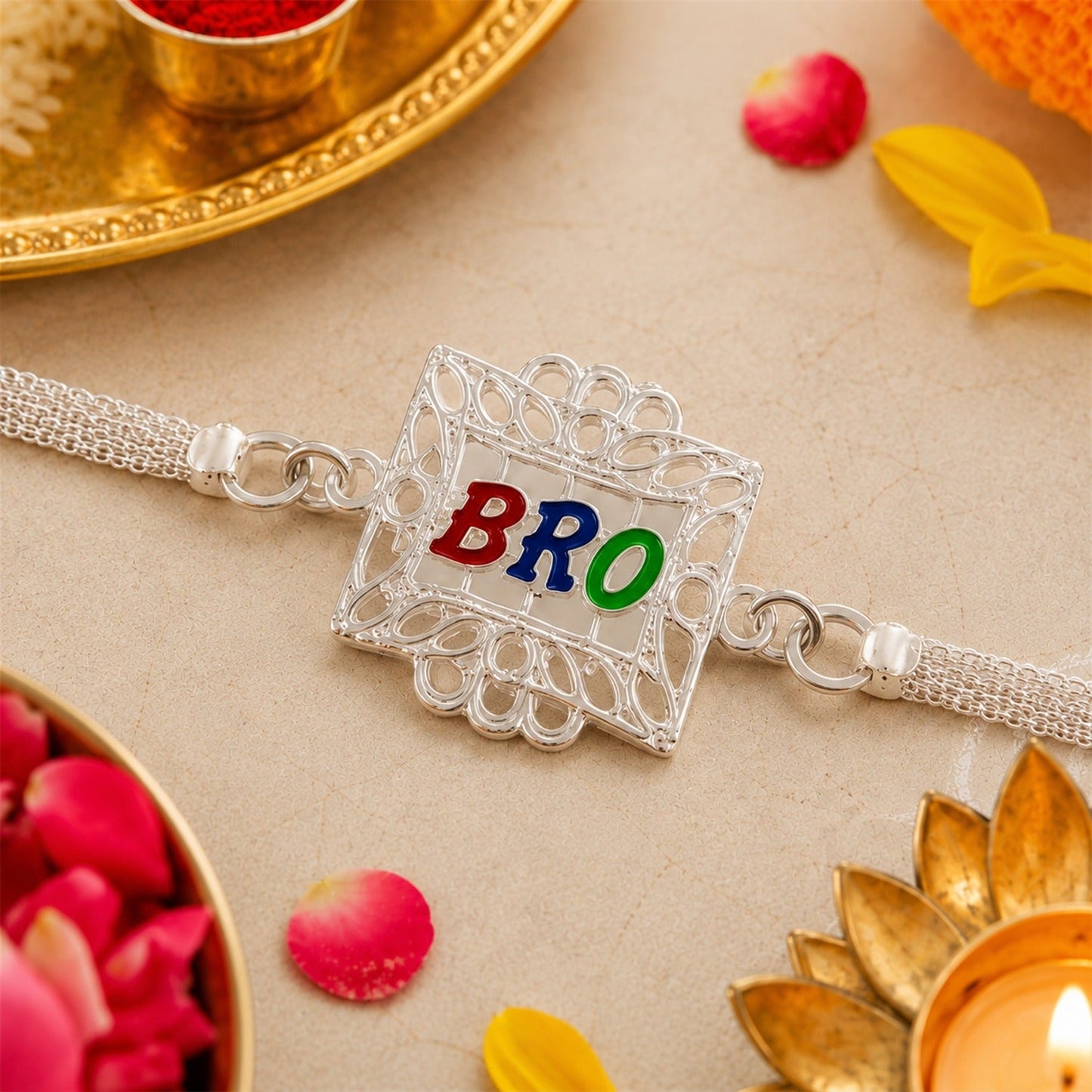 Elegant Silver Rakhi for Brother with designer square frame, presented beautifully.