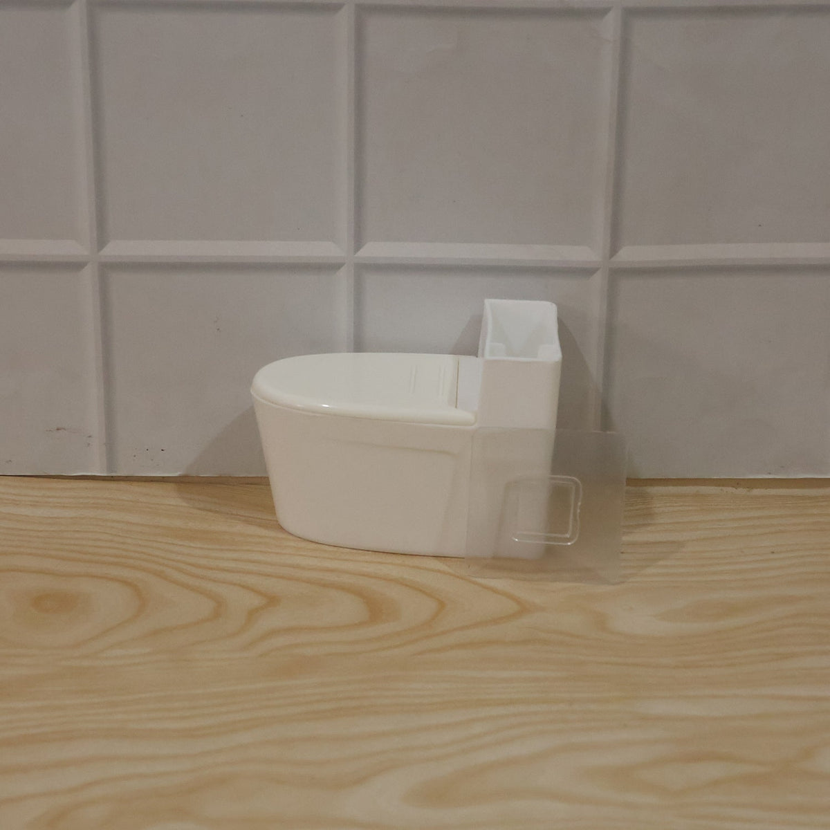 Indoor shot of toilet-shaped ashtray on a table as quirky decor
