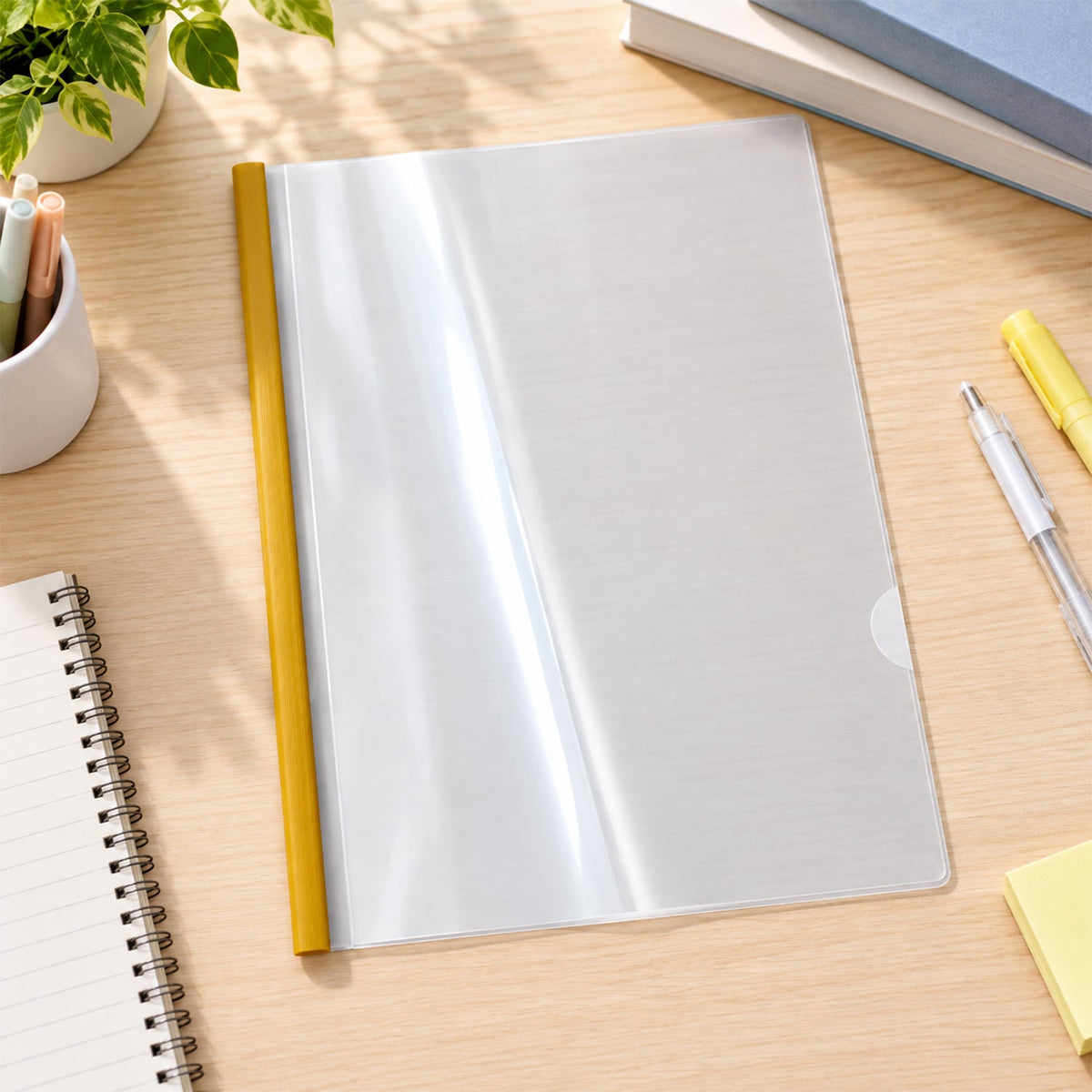 Transparent sliding document folder closed on a desk