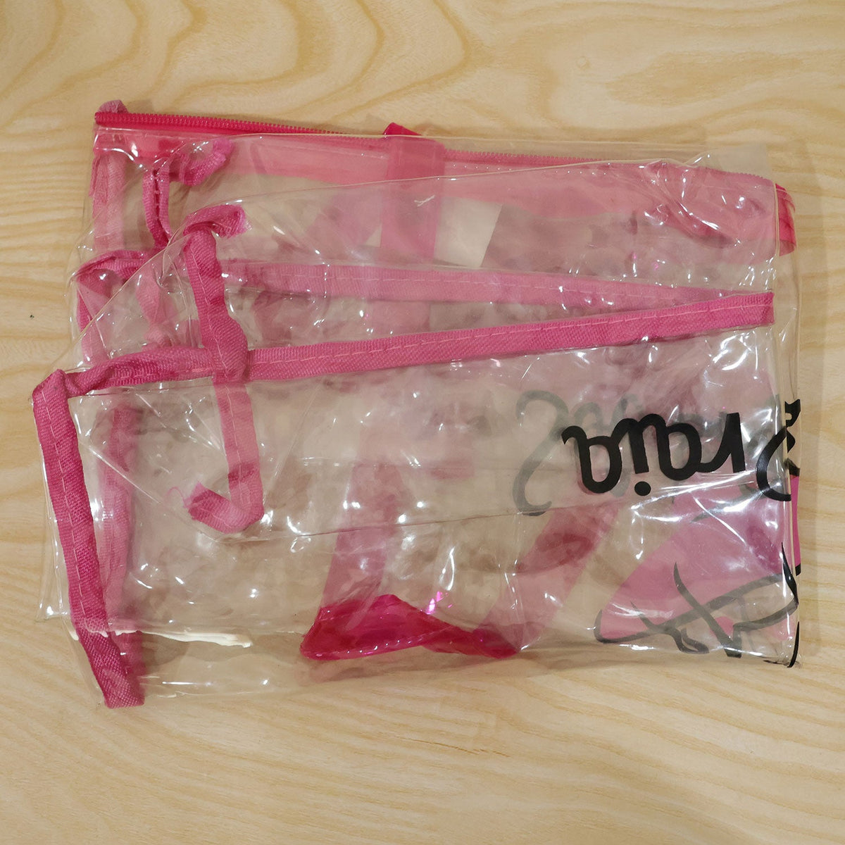 Actual photograph of folded transparent PVC tote bag