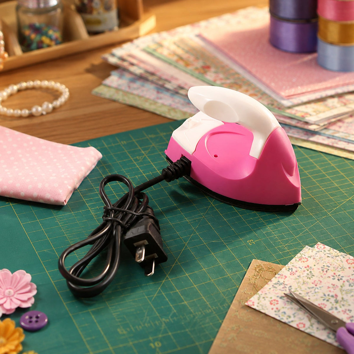 Mini iron with foldable handle