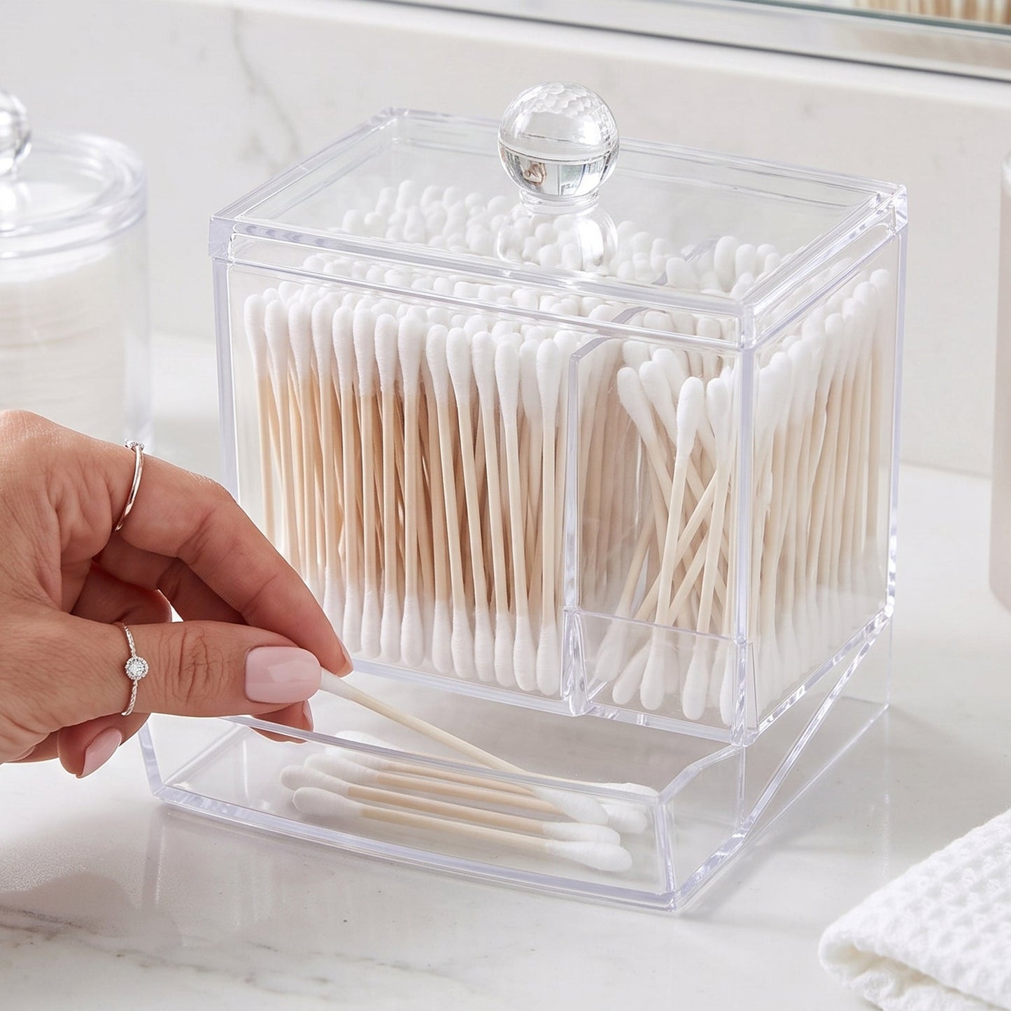 Swab organizer placed on a bathroom vanity counter