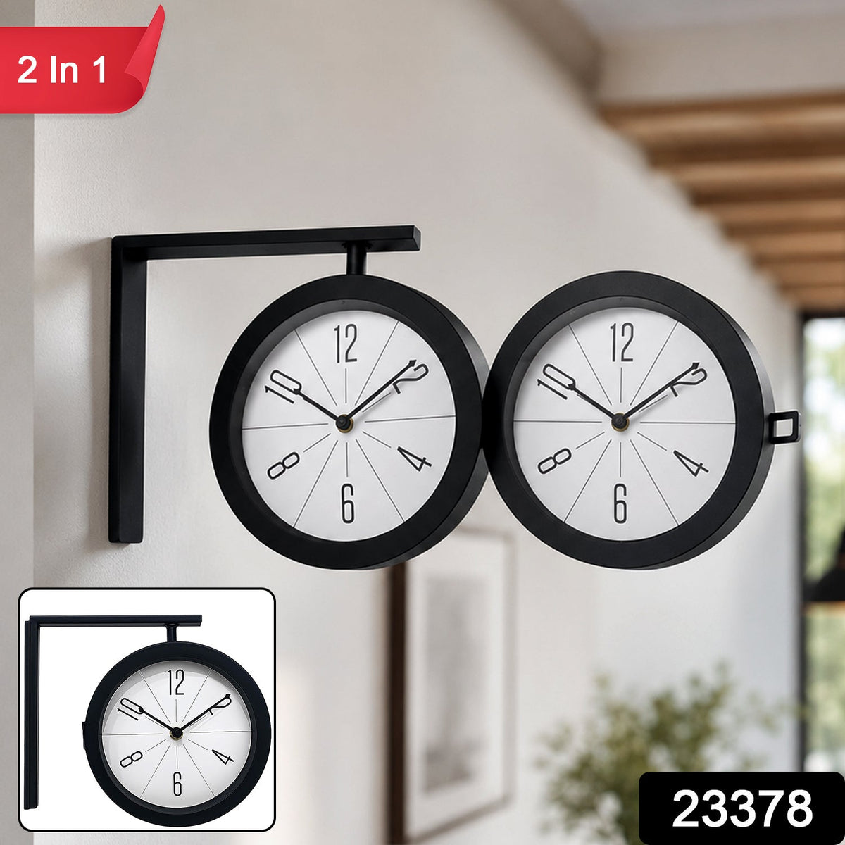 A black dual-faced clock with a white dial and bold numerals, attached to a light-colored wall.